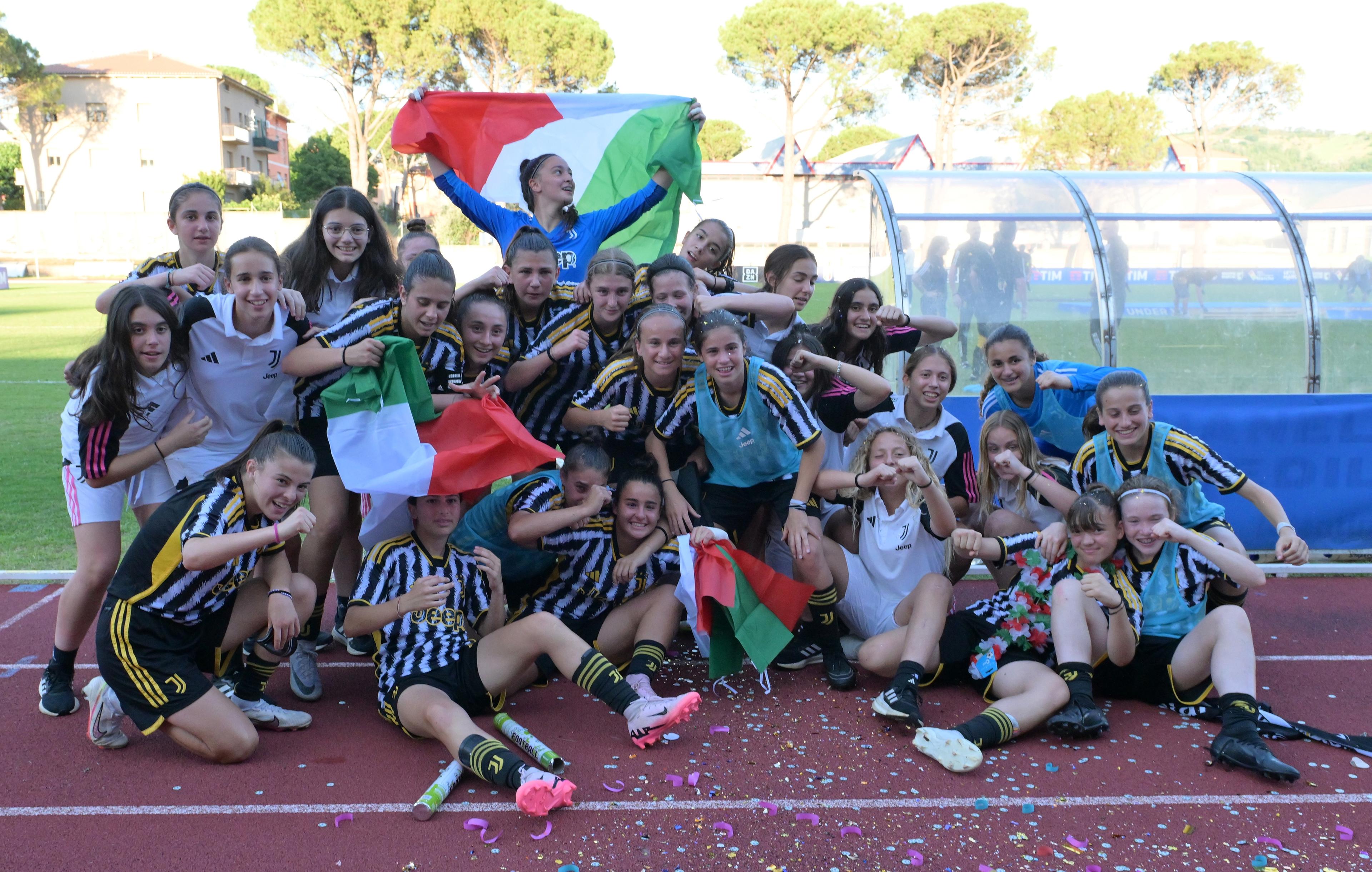 TOLENTINO, ITALY - JUNE 27: Players of Juventus celebrate the victory after the U15 Women Final match between AS Roma and Juventus at on June 27, 2024 in Tolentino, Italy. (Photo by Giuseppe Bellini/Getty Images)