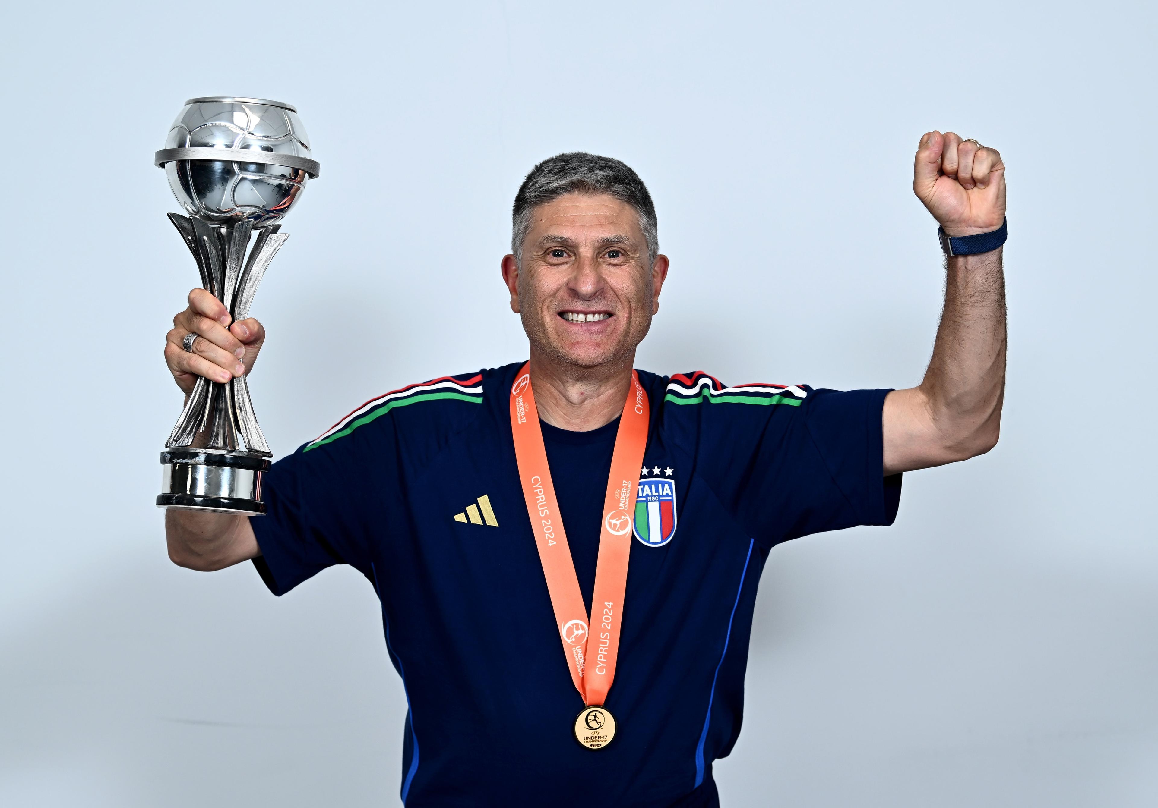 LIMASSOL, CYPRUS - June 05: Italy head coach Massimiliano Favo during the winners' shoot after the UEFA European Under-17 Championship 2023/2024 Final match between Italy and Portugal at Limassol Stadium on June 05, 2024 in Limassol, Cyprus. (Photo by Piaras Ã“ MÃdheach - Sportsfile/UEFA via Getty Images)