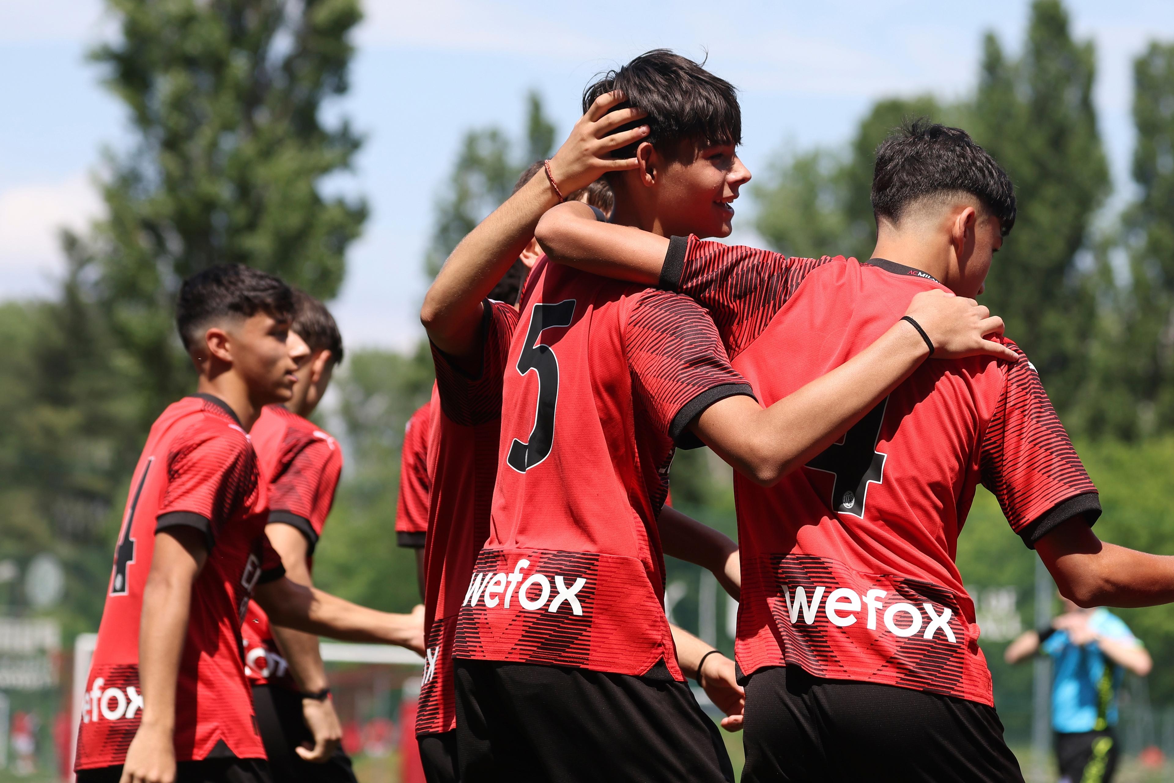 MILAN, ITALY - MAY 19: Giacomo Zangrillo of AC Milan U15 celebrates his goal with his team-mates during the Italian Championship Playoffs round of 16 second leg match between AC Milan U15 and Torino U15 at Vismara PUMA House of Football on May 19, 2024 in Milan, Italy.  (Photo by Giuseppe Cottini/AC Milan via Getty Images)