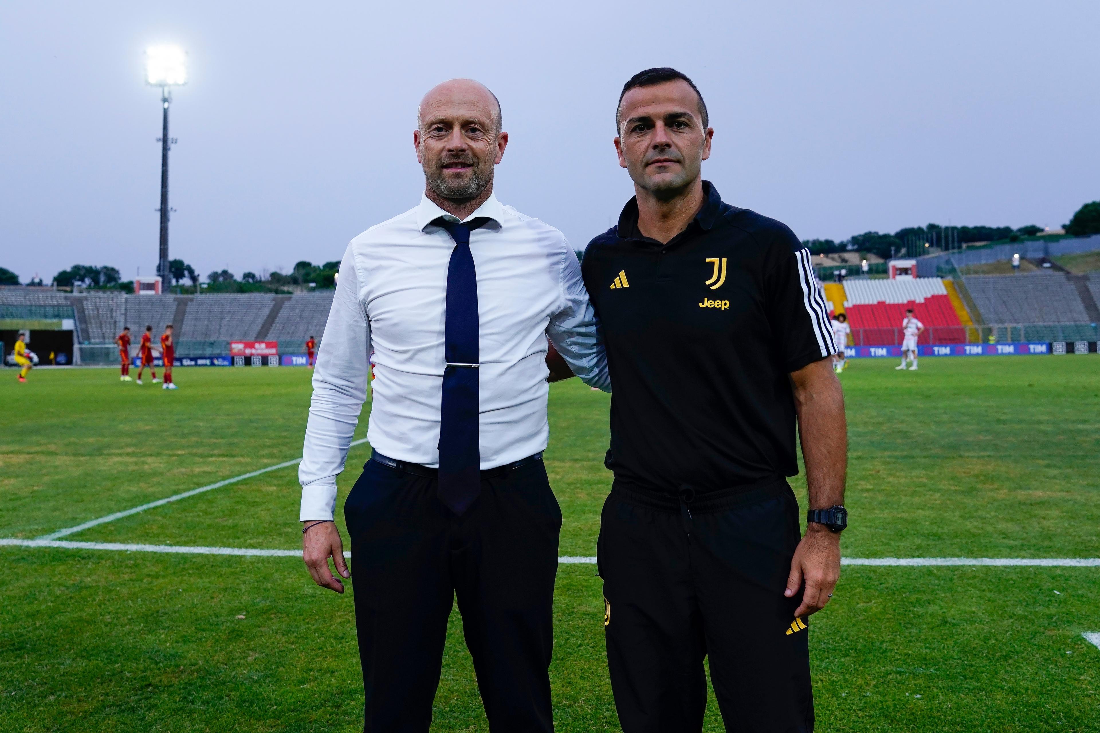 ANCONA, ITALY - JUNE 19: Gianluca Falsini head coach of AS Roma U17 (L) an Claudio Rivalta head coach of Juventus FC U17 (R) during the Serie A & B U17 Semi-final match between AS Roma and Juventus at Del Conero Stadium on June 19, 2024 in Ancona, Italy. (Photo by Danilo Di Giovanni/Getty Images)
