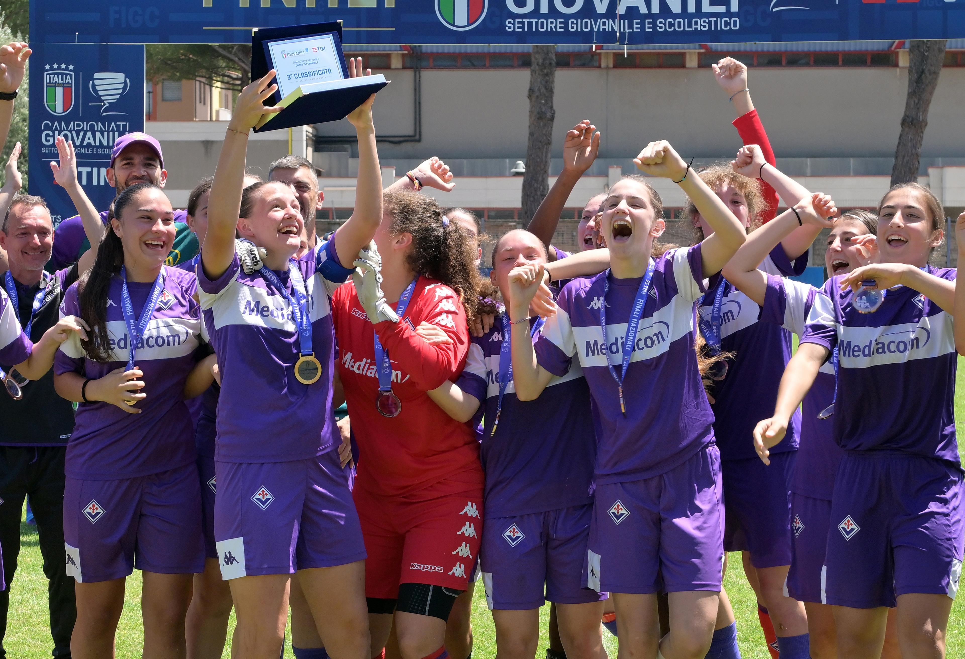 TOLENTINO, ITALY - JUNE 27: Players of Fiorentina celebrates the victory after the U15 Women 3rd Place Final match between Pro Sesto and Fiorentina on June 27, 2024 in Tolentino, Italy. (Photo by Giuseppe Bellini/Getty Images)