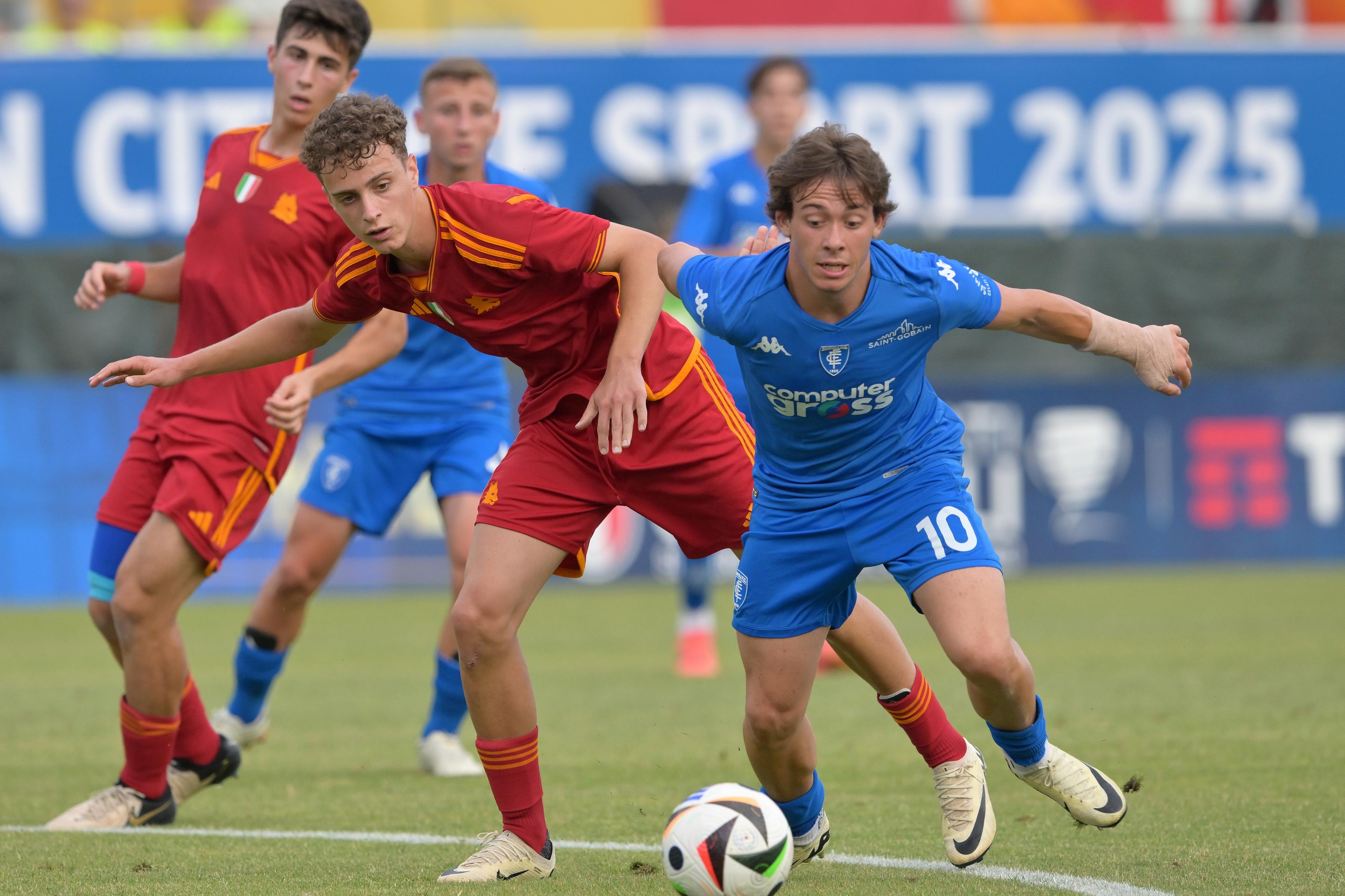ASCOLI PICENO, ITALY - JUNE 21: Alessandro Di Nunzio of AS Roma and Simone Menconi of Empoli FC in action during the Serie A & B U17 Final match between AS Roma and Empoli FC at Stadio Cino e Lillo Del Duca on June 21, 2024 in Ascoli Piceno, Italy. (Photo by Giuseppe Bellini/Getty Images)