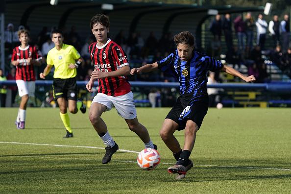 MILAN, ITALY - NOVEMBER 03:  (R) Pietro Omini of FC Internazionale U15 shoots the ball during the match between FC Internazionale U15 and AC Milan U15 on November 03, 2024 in Milan, Italy. (Photo by Pier Marco Tacca - Inter/Inter via Getty Images)