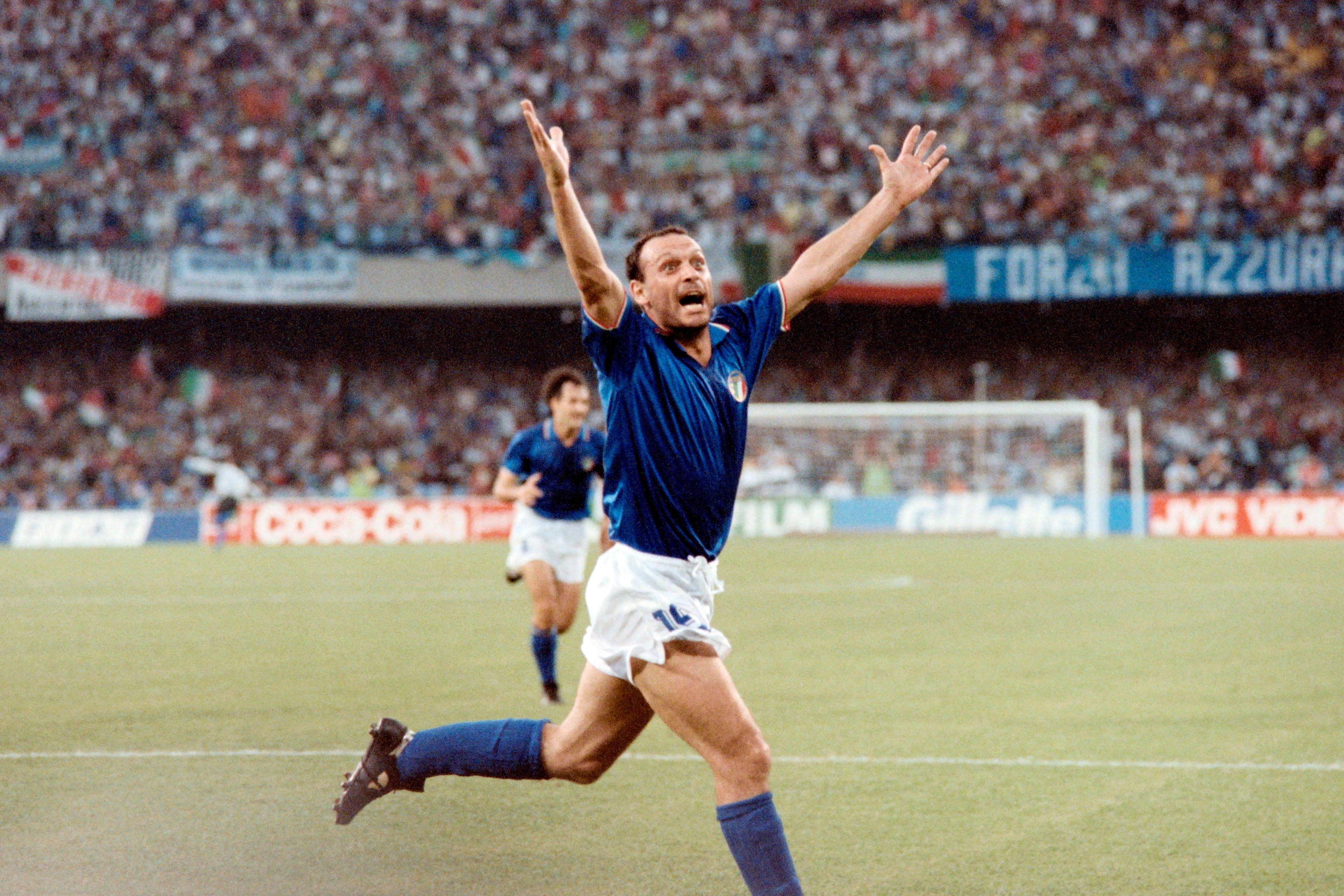 Italian forward Salvatore Schillaci exults after scoring his team\\'s first goal during the World Cup semifinal soccer match between Italy and Argentina 03 July 1990 in Naples. \\nArgentina and Italy played to a 1-1 tie but Argentina advanced to the finals with a 4-3 victory on penalty kicks dashing the hopes of Italian fans of a World Cup victory by their team on home soil.   / AFP PHOTO / DANIEL GARCIA        (Photo credit should read DANIEL GARCIA/AFP/Getty Images)