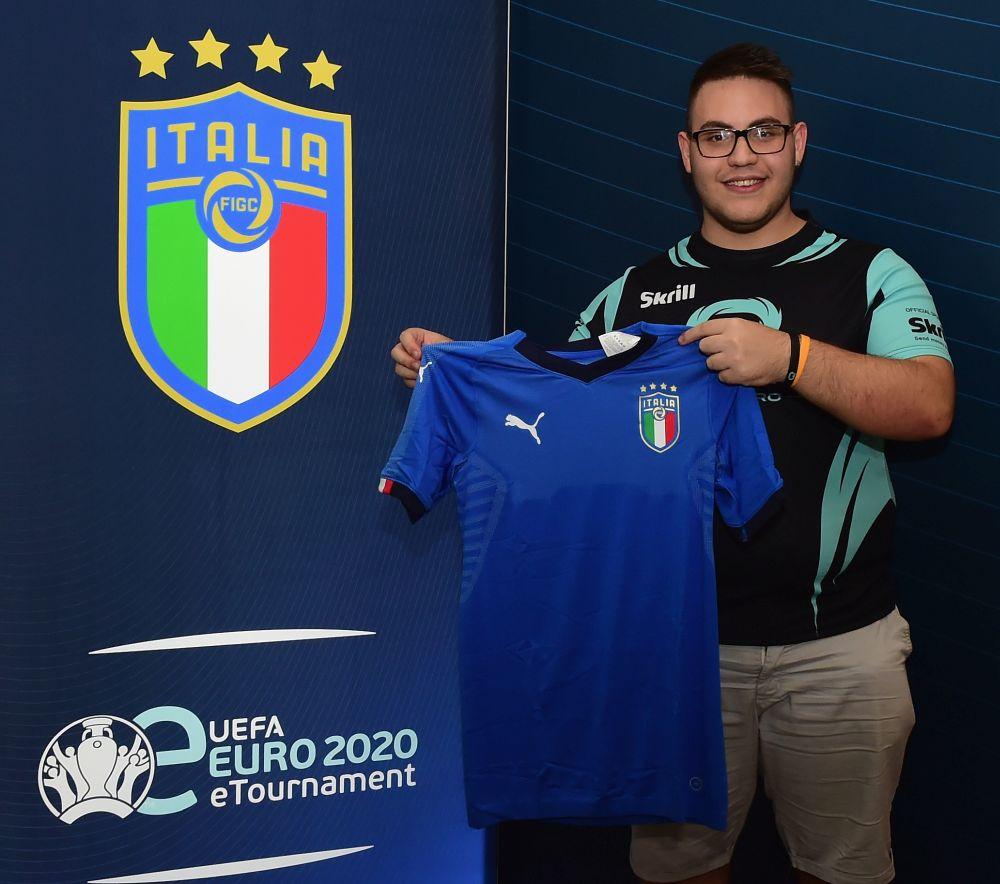MILAN, ITALY - SEPTEMBER 30: Luigi Loffredo of Qlash Team celebrates the victory and receives the official shirt of the Italian national team at the end of the Italy eFootball Pro Evolution Soccer 2020 Team Selection at BASE Milano on September 30, 2019 in Milan, Italy. (Photo by Pier Marco Tacca/Getty Images)