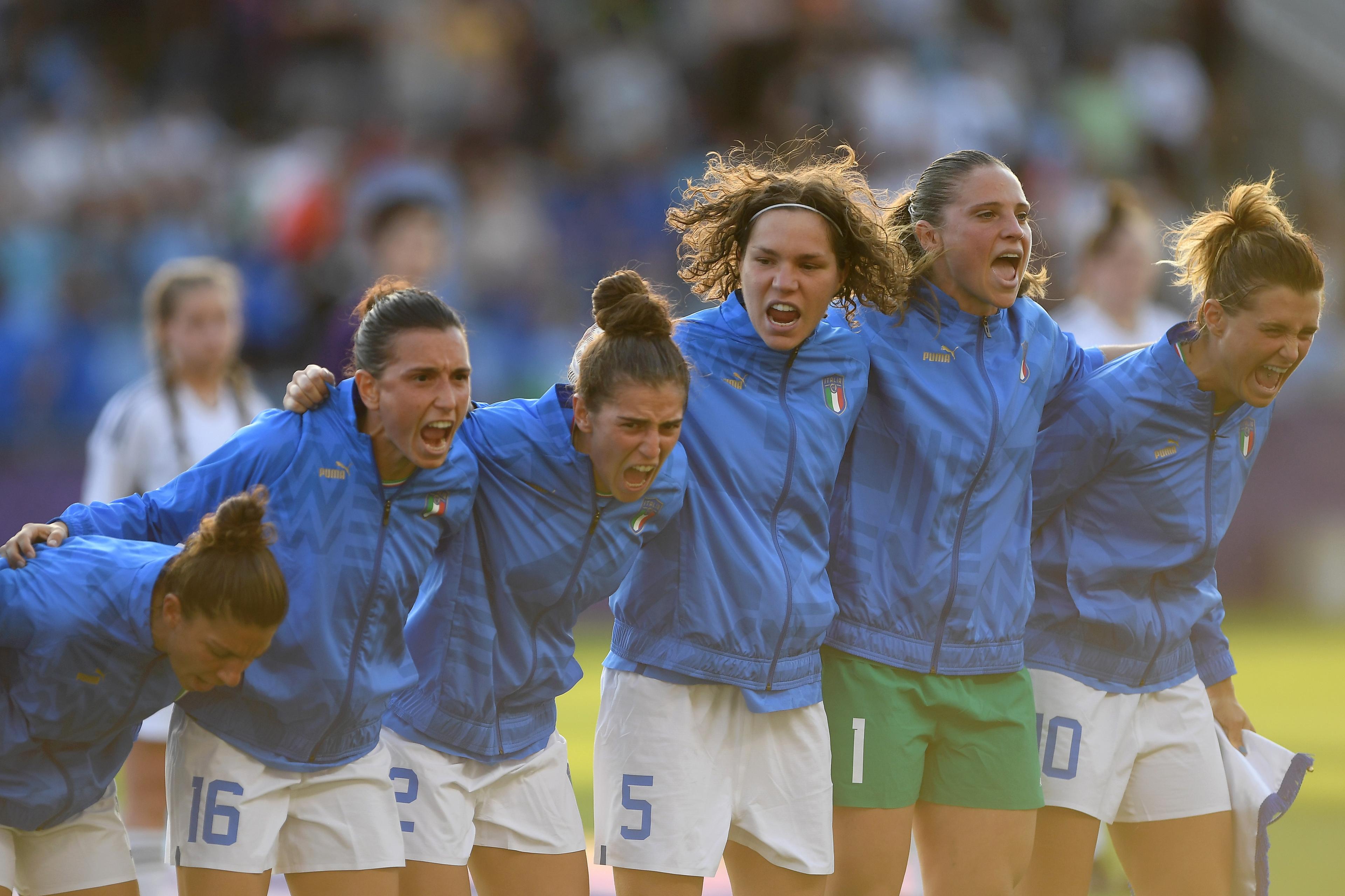 MANCHESTER, ENGLAND - JULY 18: Elisa Bartoli, Lucia Di Guglielmo, Valentina Bergamaschi, Elena Linari, Laura Giuliani, and Cristiana Girelli of Italy sing their national anthem prior to the UEFA Women\\'s Euro England 2022 group D match between Italy and Belgium at Manchester City Academy Stadium on July 18, 2022 in Manchester, England. (Photo by Harriet Lander/Getty Images)