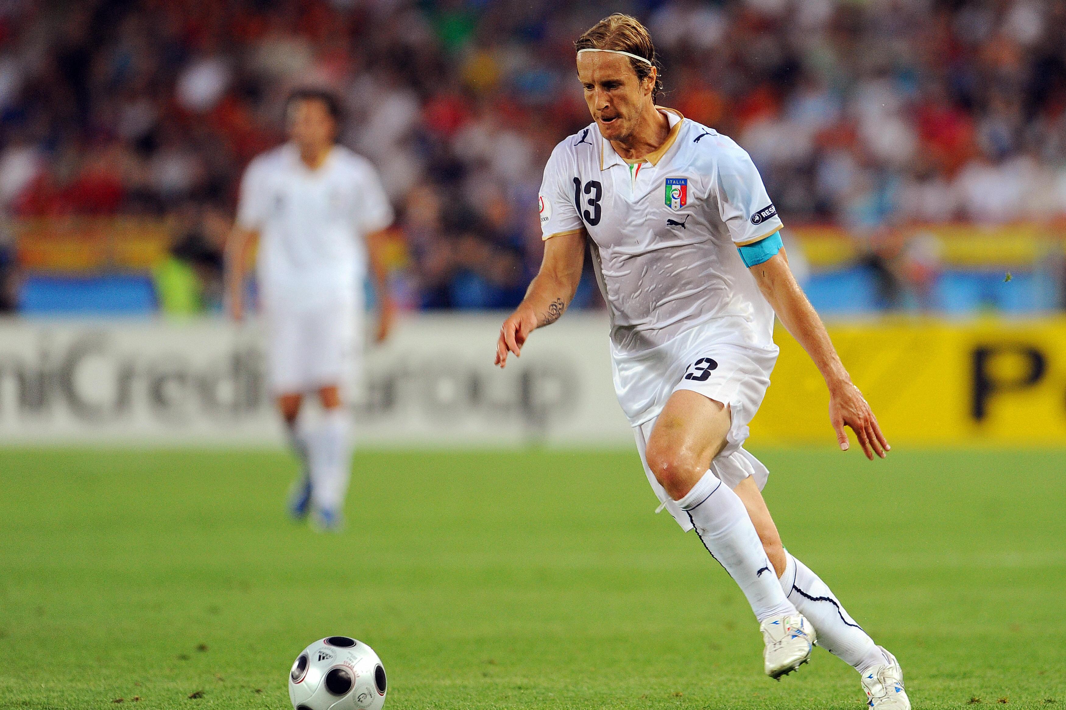 Italian midfielder Massimo Ambrosini runs with the ball during the Euro 2008 Championships quarter-final football match Spain vs. Italy on June 22, 2008 at Ernst Happel stadium in Vienna.  AFP PHOTO / JAVIER SORIANO  -- MOBILE SERVICES OUT -- (Photo credit should read JAVIER SORIANO/AFP via Getty Images)