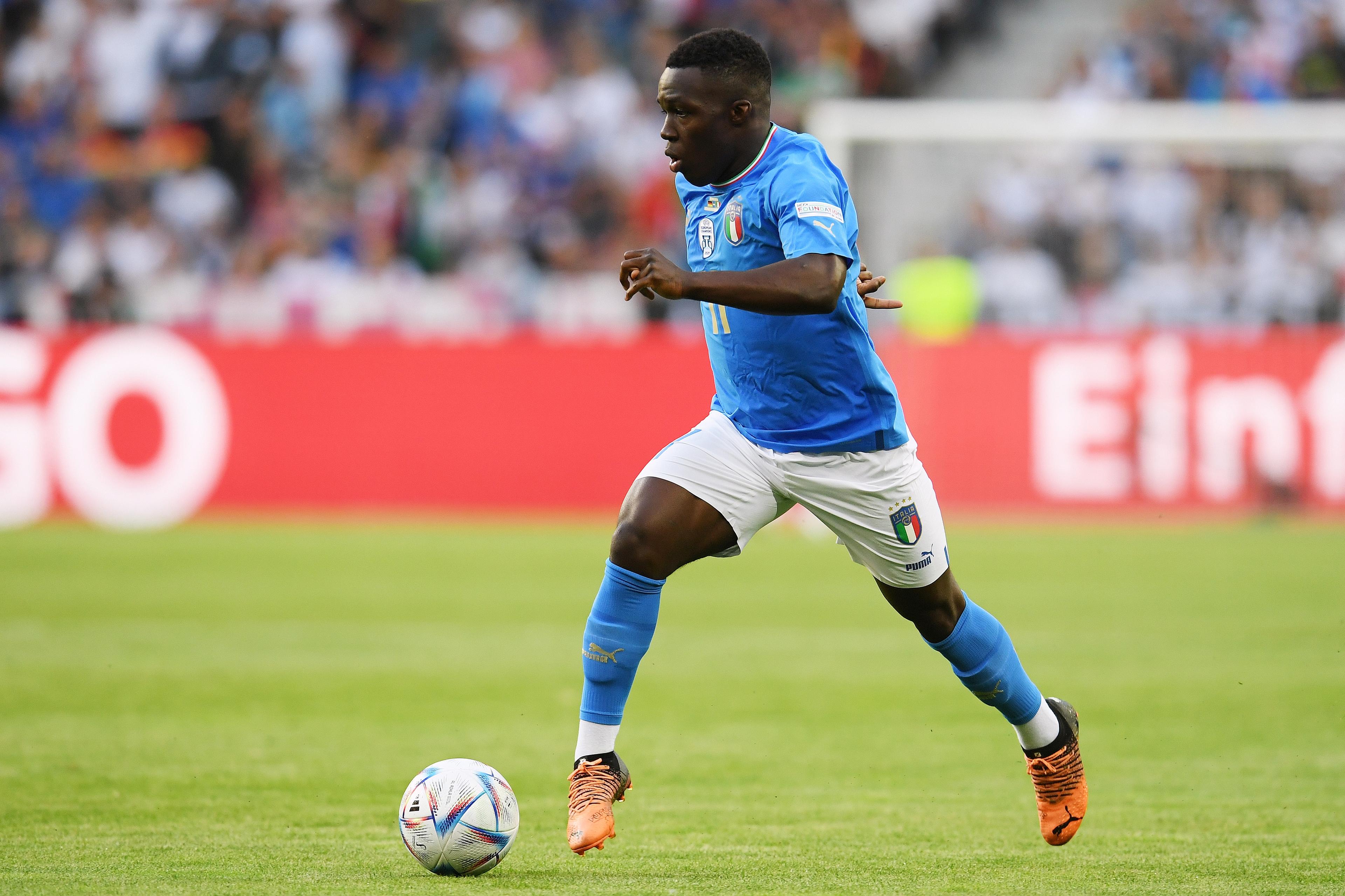 MOENCHENGLADBACH, GERMANY - JUNE 14: Degnand Wilfried Gnonto of Italy runs with the ball during the UEFA Nations League League A Group 3 match between Germany and Italy at Borussia Park Stadium on June 14, 2022 in Moenchengladbach, Germany. (Photo by Claudio Villa/Getty Images)