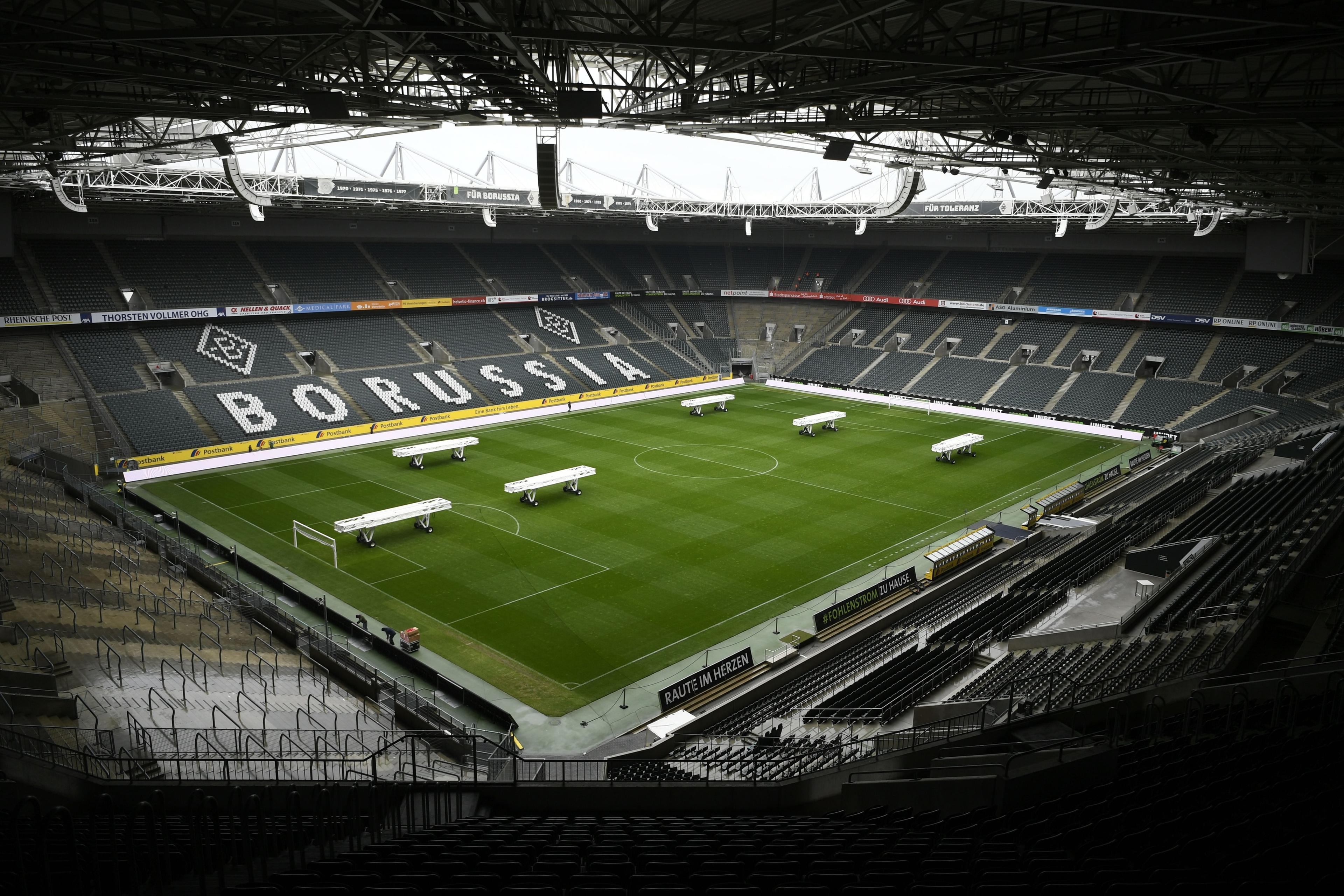 The empty Borussia-Park football stadium is pictured on March 10, 2020 in M\\u00C3\\u00B6nchengladbach. - Rhine Bundesliga derby between Borussia Moenchengladbach and Cologne, scheduled for March 11, 2020, will be held behind closed doors due to the coronavirus, the first game in Bundesliga history to be played without fans, club officials announced on March 10, 2020. Bundesliga games had been going ahead as usual, even as the number of people testing positive for the coronavirus continued to rise in Germany, passing 1,000 on March 10, 2020. (Photo by Ina FASSBENDER / AFP) (Photo by INA FASSBENDER/AFP via Getty Images)