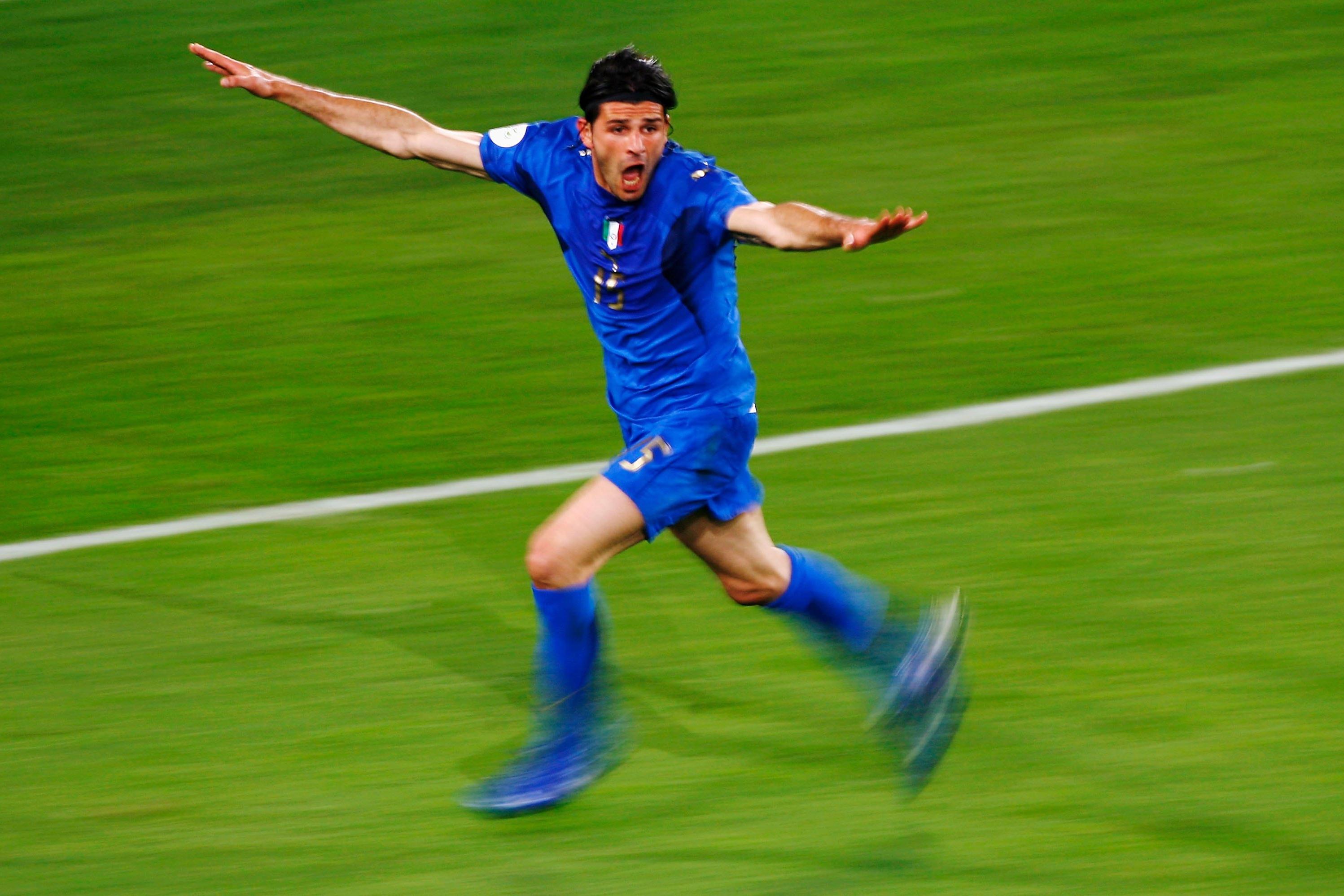 HANOVER, GERMANY - JUNE 12: Vincenzo Iaquinta of Italy celebrates scoring his team\\'s second goal during the FIFA World Cup Germany 2006 Group E match between Italy and Ghana played at the Stadium Hanover on June 12, 2006 in Hanover, Germany. (Photo by Shaun Botterill/Getty Images)