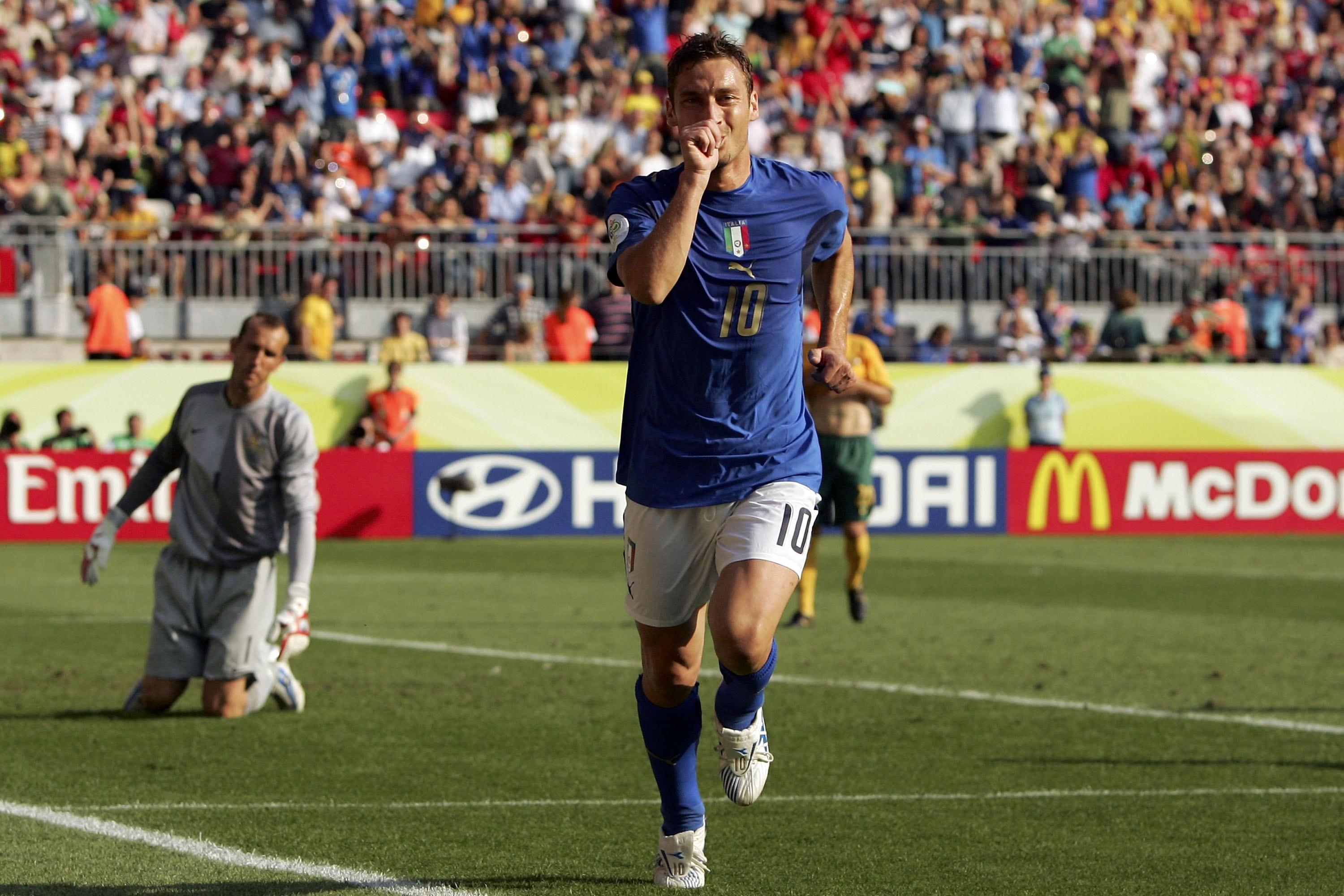 KAISERSLAUTERN, GERMANY - JUNE 26:  Francesco Totti of Italy celebrates, after scoring the match winning penalty during the FIFA World Cup Germany 2006 Round of 16 match between Italy and Australia at the Fritz-Walter Stadium on June 26, 2006 in Kaiserslautern, Germany.  (Photo by Robert Cianflone/Getty Images)