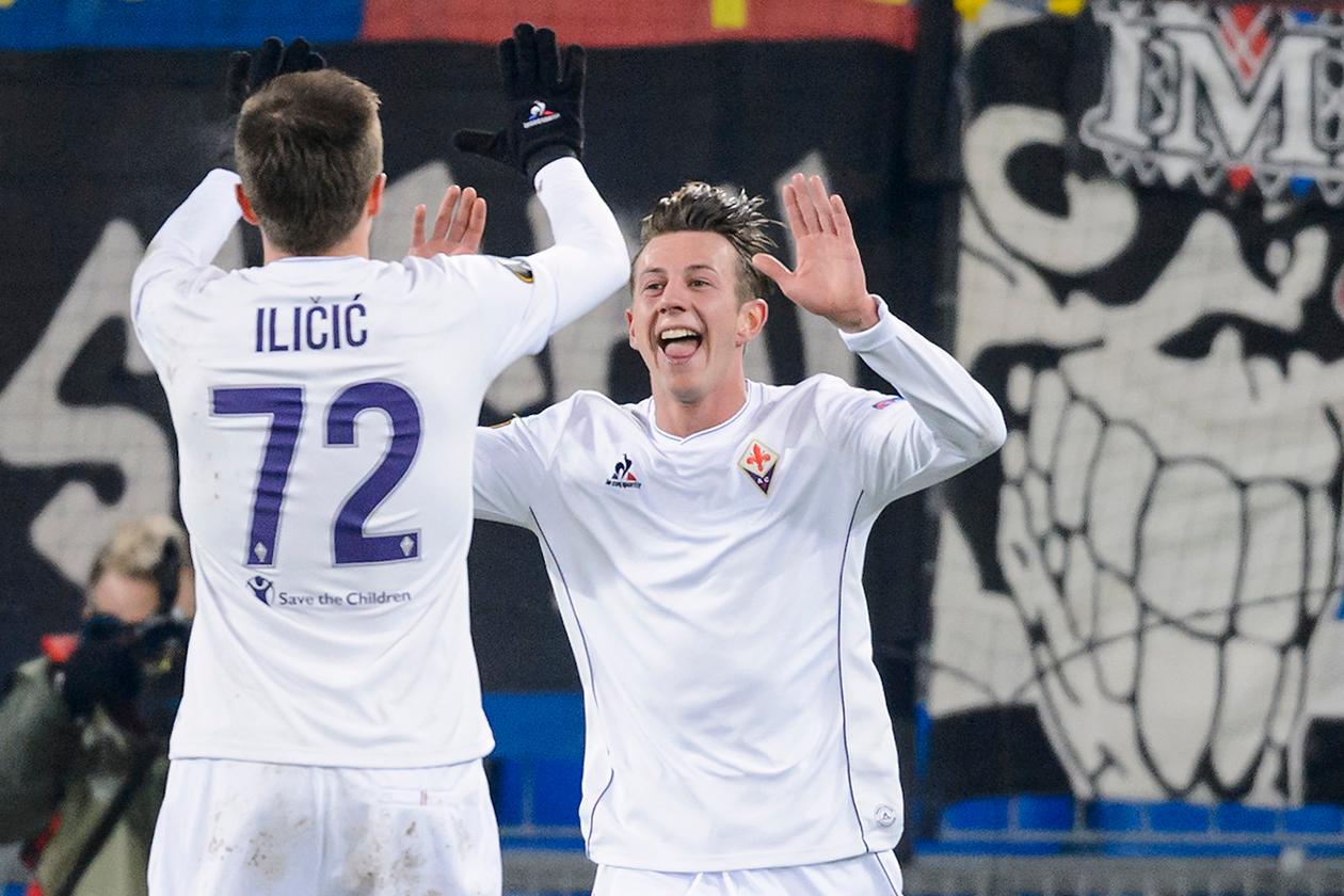 Fiorentina\\'s Italian forward Federico Bernardeschi (R) celebrates with Slovenian midfielder Josip Ilicic after scoring a goal during the UEFA Europa League group I football match between Basel and Fiorentina at the St Jakob stadium in Basel on November 26, 2015.  AFP PHOTO / FABRICE COFFRINI / AFP / FABRICE COFFRINI        (Photo credit should read FABRICE COFFRINI/AFP/Getty Images)