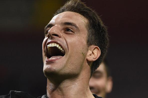 AC Milan\\'s midfielder from Italy Giacomo Bonaventura celebrates after scoring during the Italian Serie A football match AC Milan vs Palermo on September 19, 2015 at the San Siro Stadium stadium in Milan. AFP PHOTO / OLIVIER MORIN        (Photo credit should read OLIVIER MORIN/AFP/Getty Images)