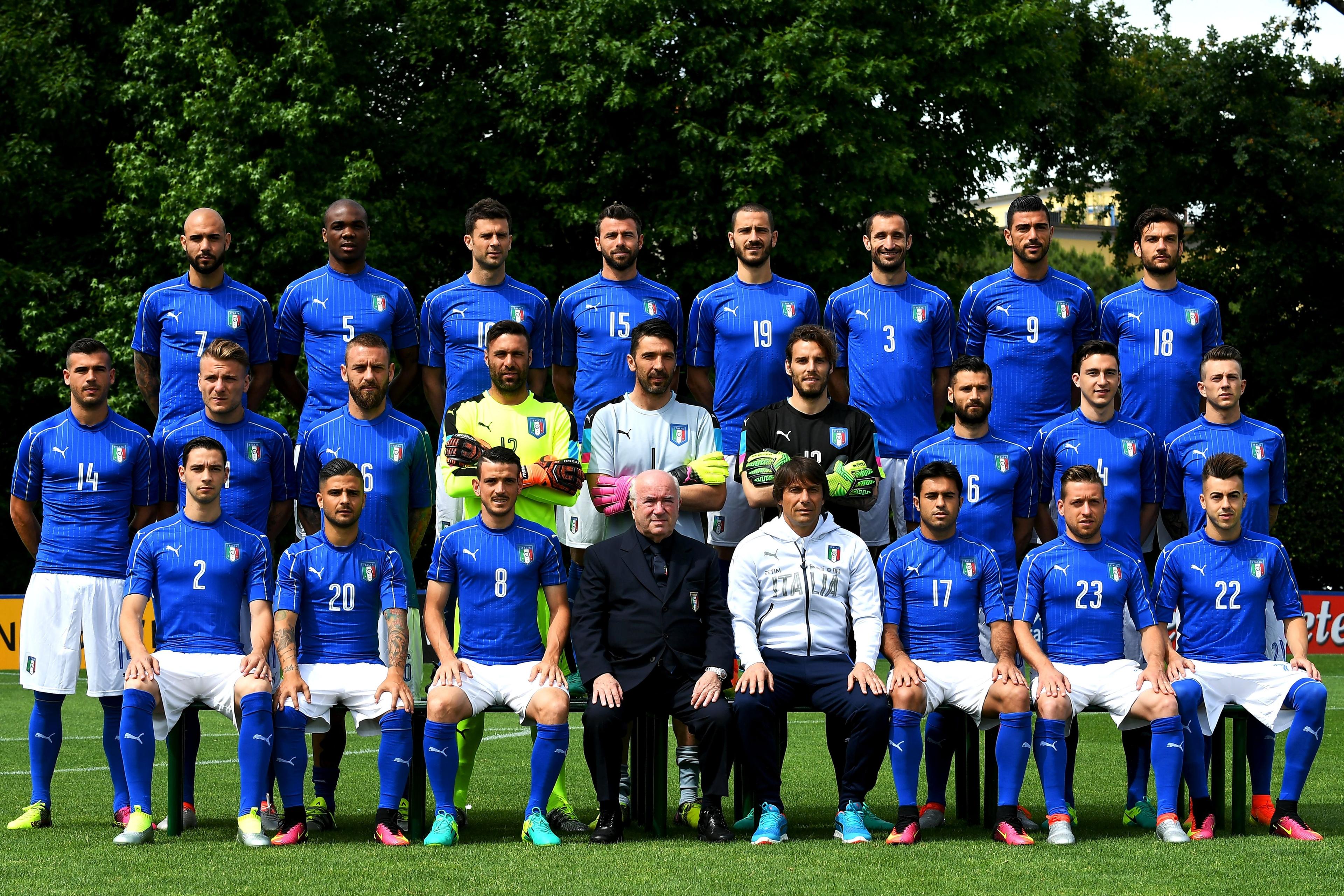 Italy soccer team players pose on June 1, 2016 in the Florence\\'s Coverciano training camp, during the official presentation prior to the Euro Championship in France. From top left : Italy\\'s forward Simone Zaza, Italy\\'s defender Angelo Obinze Ogbonna, Italy\\'s midfielder Thiago Motta, Italy\\'s defender Andrea Barzagli, Italy\\'s defender Leonardo Bonucci, Italy\\'s defender Giorgio Chiellini, Italy\\'s forward Graziano Pell\\u00E8, Italy\\'s midfielder Marco Parolo. From left center : Italy\\'s midfielder Stefano Sturaro, Italy\\'s forward Ciro Immobile, Italy\\'s midfielder Daniele De Rossi, Italy\\'s goalkeeper Salvatore Sirigu, Italy\\'s goalkeeper Gianluigi Buffon, Italy\\'s goalkeeper Federico Marchetti, Italy\\'s midfielder Antonio Candreva, Italy\\'s midfielder Matteo Darmian, Italy\\'s midfielder Federico Bernardeschi.  From left bottom : Italy\\'s midfielder Mattia De Sciglio, Italy\\'s forward Lorenzo Insigne, Italy\\'s midfielder Alessandro Florenzi, President Carlo Tavecchio, Italy\\'s coach Antonio Conte, Italy\\'s forward Citadin Martins Ede, Italy\\'s midfielder Emanuele Giaccherini, Italy\\'s midfielder Stephan El Shaarawy. / AFP / VINCENZO PINTO        (Photo credit should read VINCENZO PINTO/AFP/Getty Images)