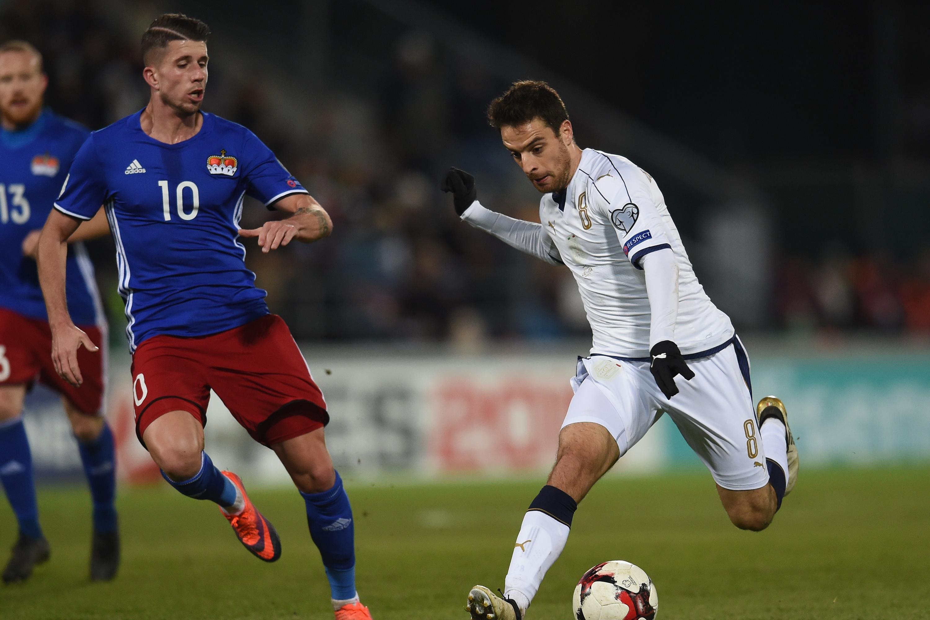 VADUZ, LIECHTENSTEIN - NOVEMBER 12: Giacomo Bonaventura (R) of Italy competes for the ball with Sandro Wieser of Liechtenstein during the FIFA World Cup 2018 group G Qualifiers football match between Liechtenstein and Italy at the Rheinpark Stadion on November 12, 2016 in Vaduz,Liechtenstein. (Photo by Claudio Villa/Getty Images)