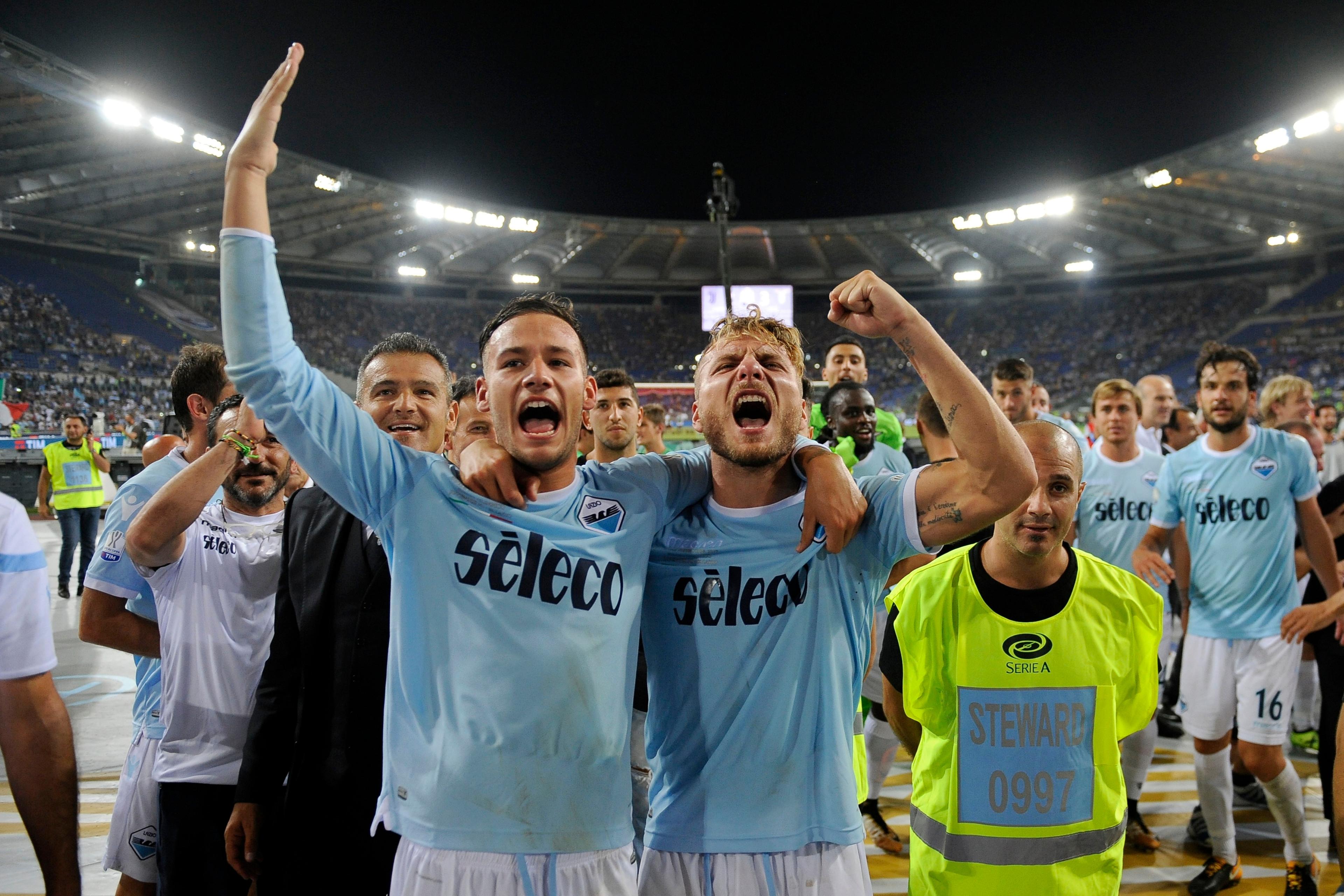 ROME, ROMA - AUGUST 13:  Alessandro Murgia and Ciro Immobile of SS Lazio with the cup after the Italian Supercup match between Juventus and SS Lazio at Stadio Olimpico on August 13, 2017 in Rome, Italy.  (Photo by Marco Rosi/Getty Images)