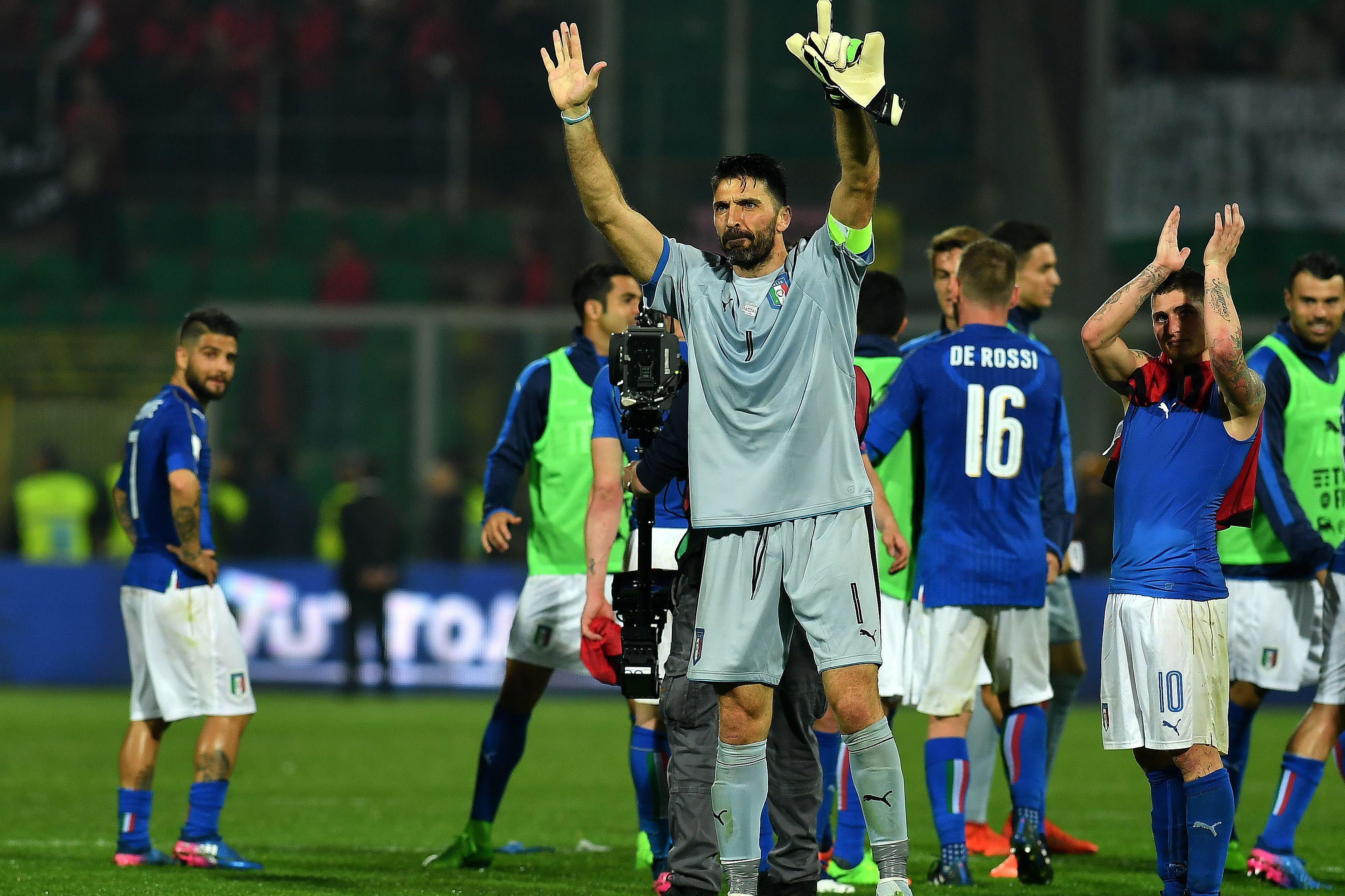 Italy\\'s goalkeeper Gianluigi Buffon greets fans at the end of the FIFA World Cup 2018 qualification football match between Italy and Albania on March 24, 2017 at Renzo Barbera stadium in Palermo. Italy won 2-0. Gianluigi Buffon made his 1,000th career appearance today against Albania. The 39-year-old Juventus stopper made his professional debut in 1995 as a 17-year-old in goal for Parma and has gone on to become a football icon at home and abroad.\\n / AFP PHOTO / ALBERTO PIZZOLI        (Photo credit should read ALBERTO PIZZOLI/AFP/Getty Images)