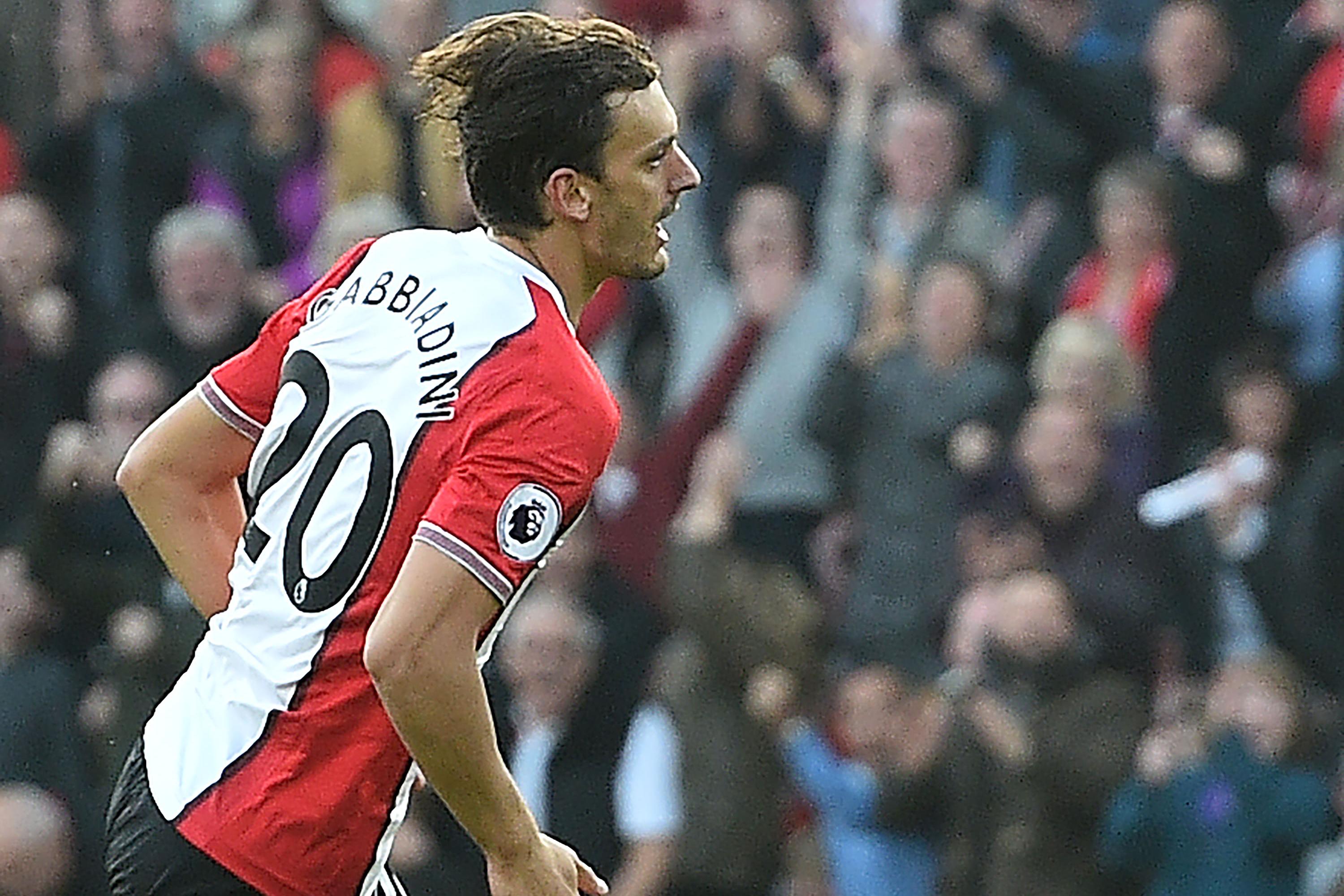 Southampton\\'s Italian striker Manolo Gabbiadini celebrates scoring their first goal to equalise during the English Premier League football match between Southampton and Newcastle United at St Mary\\'s Stadium in Southampton, southern England on October 15, 2017. / AFP PHOTO / Glyn KIRK / RESTRICTED TO EDITORIAL USE. No use with unauthorized audio, video, data, fixture lists, club/league logos or \\'live\\' services. Online in-match use limited to 75 images, no video emulation. No use in betting, games or single club/league/player publications.  /         (Photo credit should read GLYN KIRK/AFP/Getty Images)