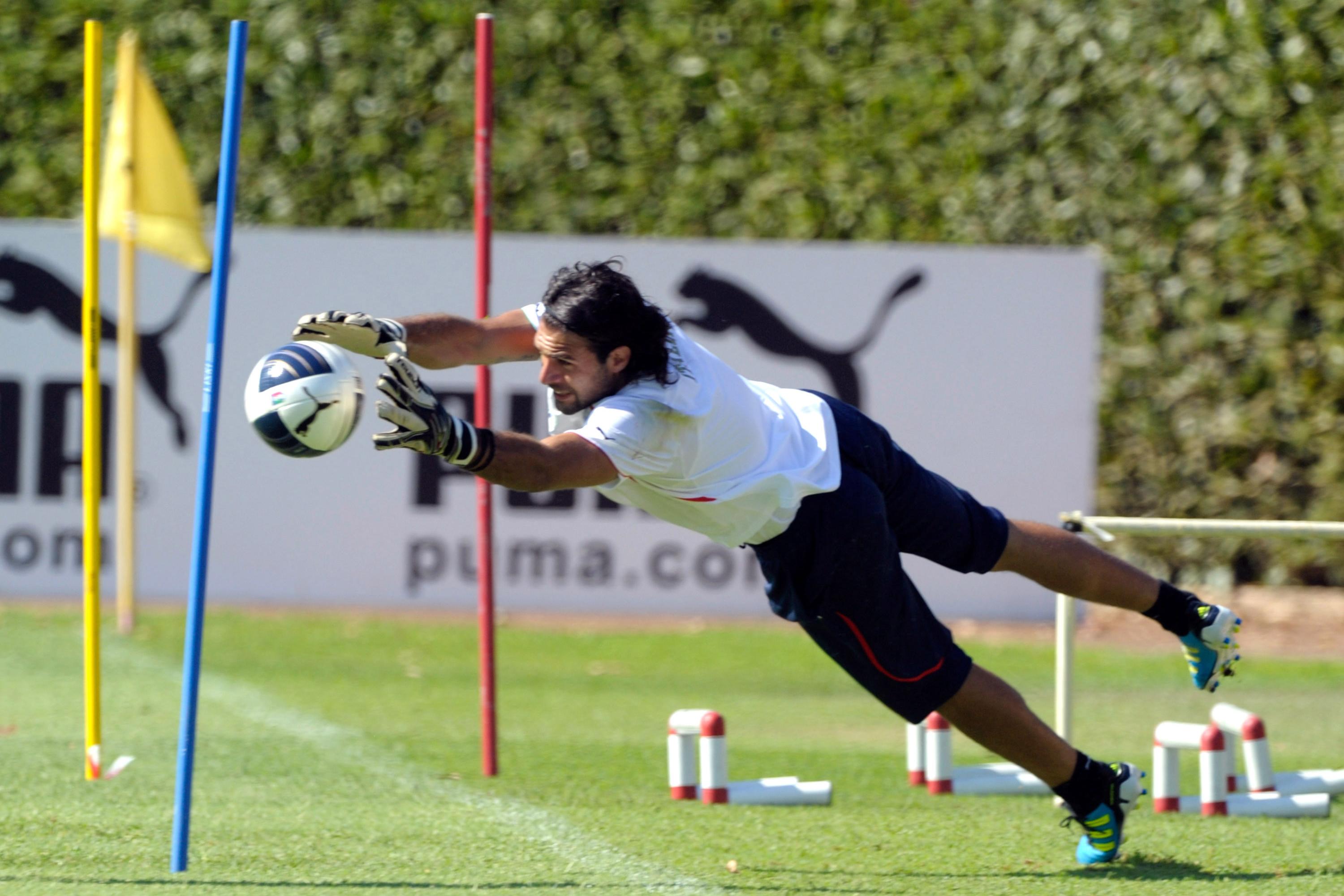 FLORENCE, ITALY - AUGUST 30: Salvatore Sirigu of Italy saves the ball during a Italy training session at Coverciano on August 30, 2011 in Florence, Italy. (Photo by Claudio Villa/Getty Images)