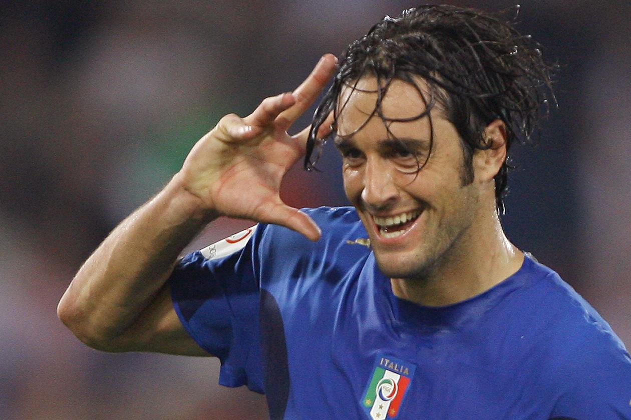 Rome, ITALY:  Italian forward Luca Toni celebrates after scoring against Ukraine during their Euro2008 qualifying Group B football match at Rome\\'s Olympic stadium, 07 October 2006. AFP PHOTO / PATRICK HERTZOG  (Photo credit should read PATRICK HERTZOG/AFP/Getty Images)
