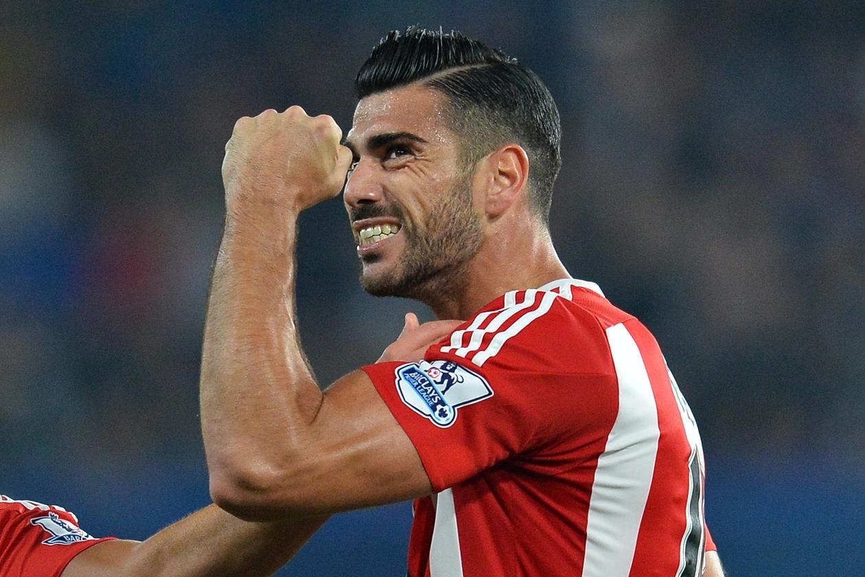 Southampton\\'s Italian striker Graziano Pelle celebrates after scoring their third goal during the English Premier League football match between Chelsea and Southampton at Stamford Bridge in London on October 3, 2015. AFP PHOTO / GLYN KIRK\\n\\nRESTRICTED TO EDITORIAL USE. No use with unauthorized audio, video, data, fixture lists, club/league logos or \\'live\\' services. Online in-match use limited to 75 images, no video emulation. No use in betting, games or single club/league/player publications.        (Photo credit should read GLYN KIRK/AFP/Getty Images)