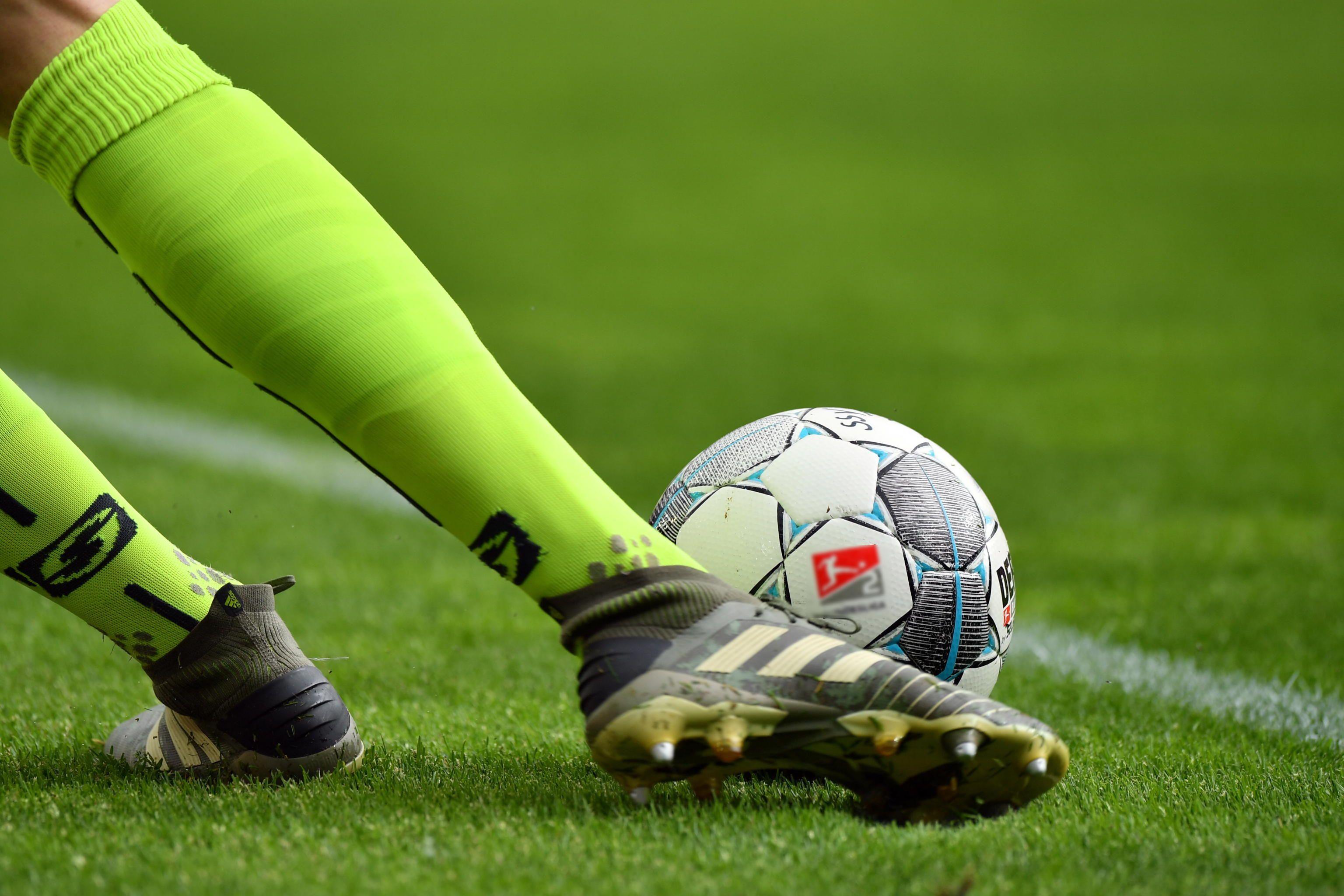 epa08468565 Goalkeeper Alexander Meyer of Regensburg kicks the ball during the Second Bundesliga match between SSV Jahn Regensburg and SV Darmstadt 98 at Continental Arena in Regensburg, Germany, 06 June 2020. EPA/SEBASTIAN WIDMANN / POOL DFL regulations prohibit any use of photographs as image sequences and/or quasi-video. GERMANY SOCCER BUNDESLIGA SECOND DIVISION