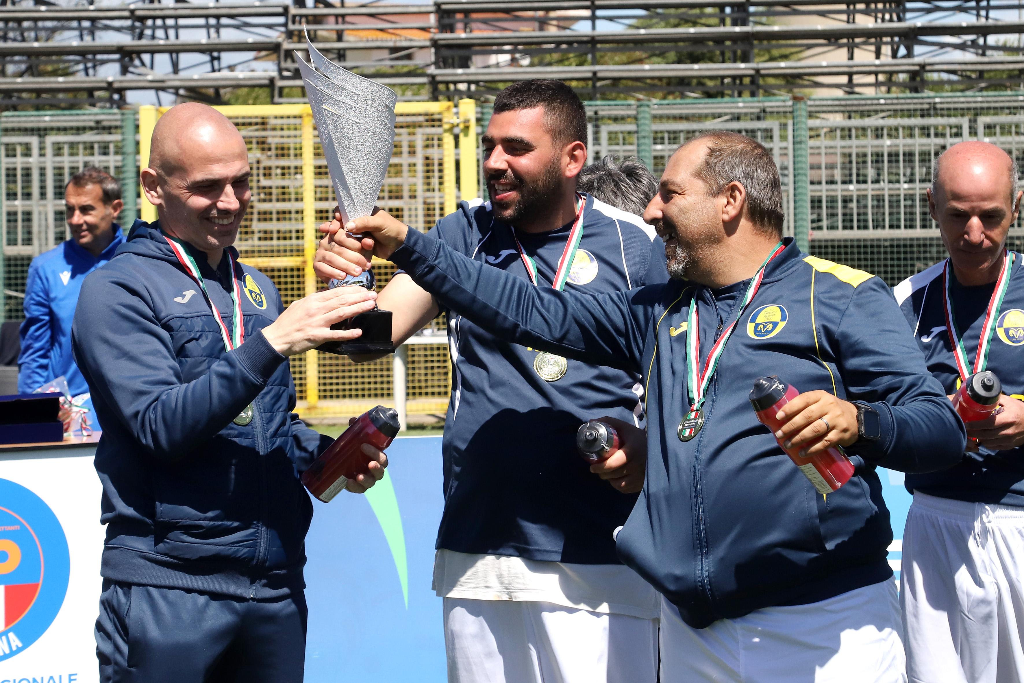ORISTANO, ITALY - APRIL 20: players celebrate with the trophy during the FIGS DCPS Sardegna finals at Sa Rodia on April 20, 2024 in Oristano, Italy. (Photo by Enrico Locci/Getty Images)