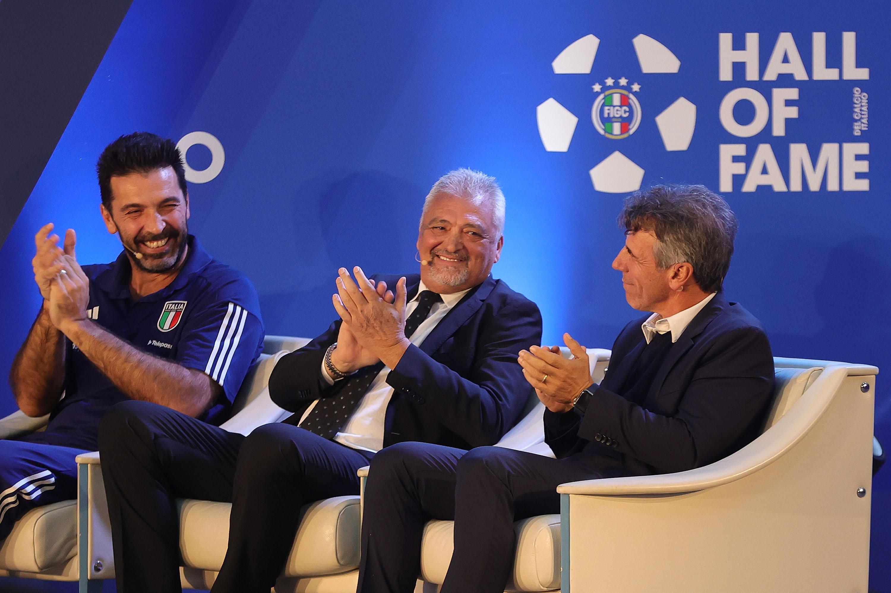 FLORENCE, ITALY - NOVEMBER 13: Gianluigi Buffon Head of the Italian National Football Delegation, Alessandro Altobelli former world champion footballer in 1982 World Cup in Spain and Gianfranco Zola former footballer of Nuorese, Torres, Napoli, Parma, Chelsea and Cagliari during FIGC Hall of Fame at Centro Tecnico Federale di Coverciano on November 13, 2023 in Florence, Italy. (Photo by Gabriele Maltinti/Getty Images) *** Local Caption *** Gianluigi Buffon; Alessandro Alessandro Altobelli former world champion footballer in 1982 World Cup in Spain; Gianfranco Zola