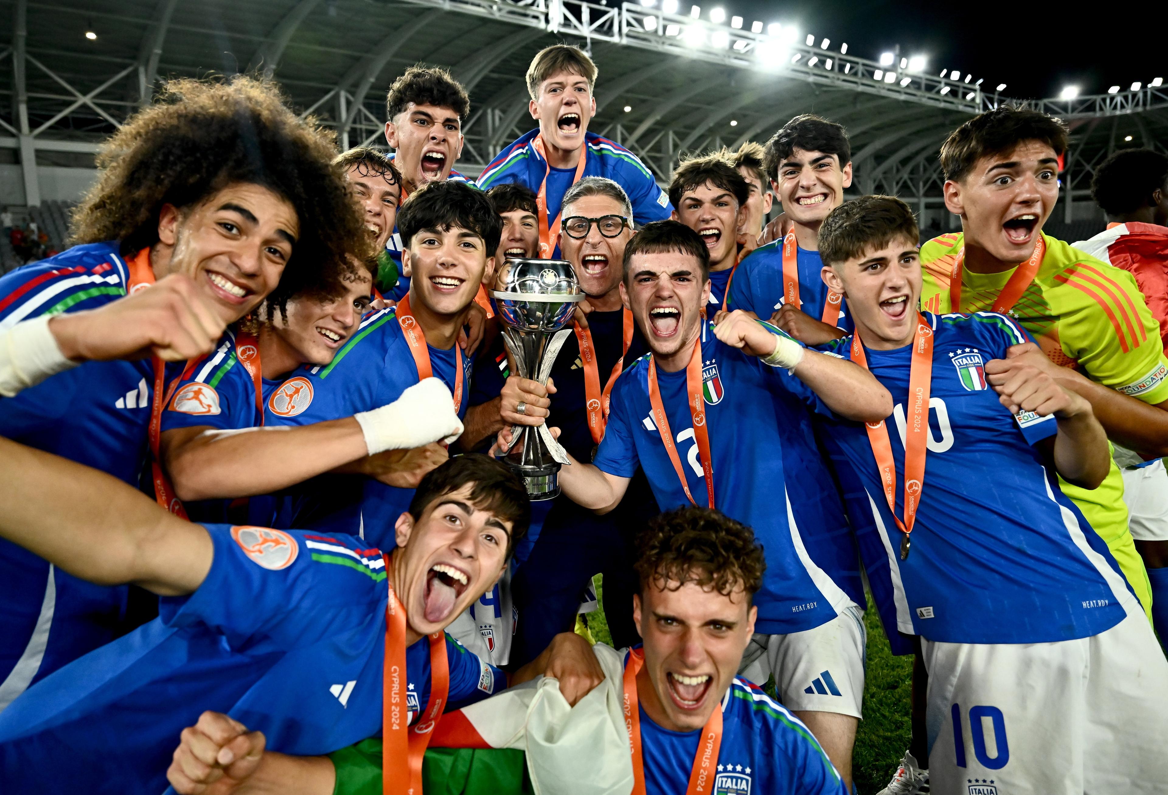LIMASSOL, CYPRUS - June 05: Italy head coach Massimiliano Favo, centre, and players celebrate after the UEFA European Under-17 Championship 2023/2024 Final match between Italy and Portugal at Limassol Stadium on June 05, 2024 in Limassol, Cyprus. (Photo by Piaras Ó MÃdheach - Sportsfile/UEFA via Getty Images)