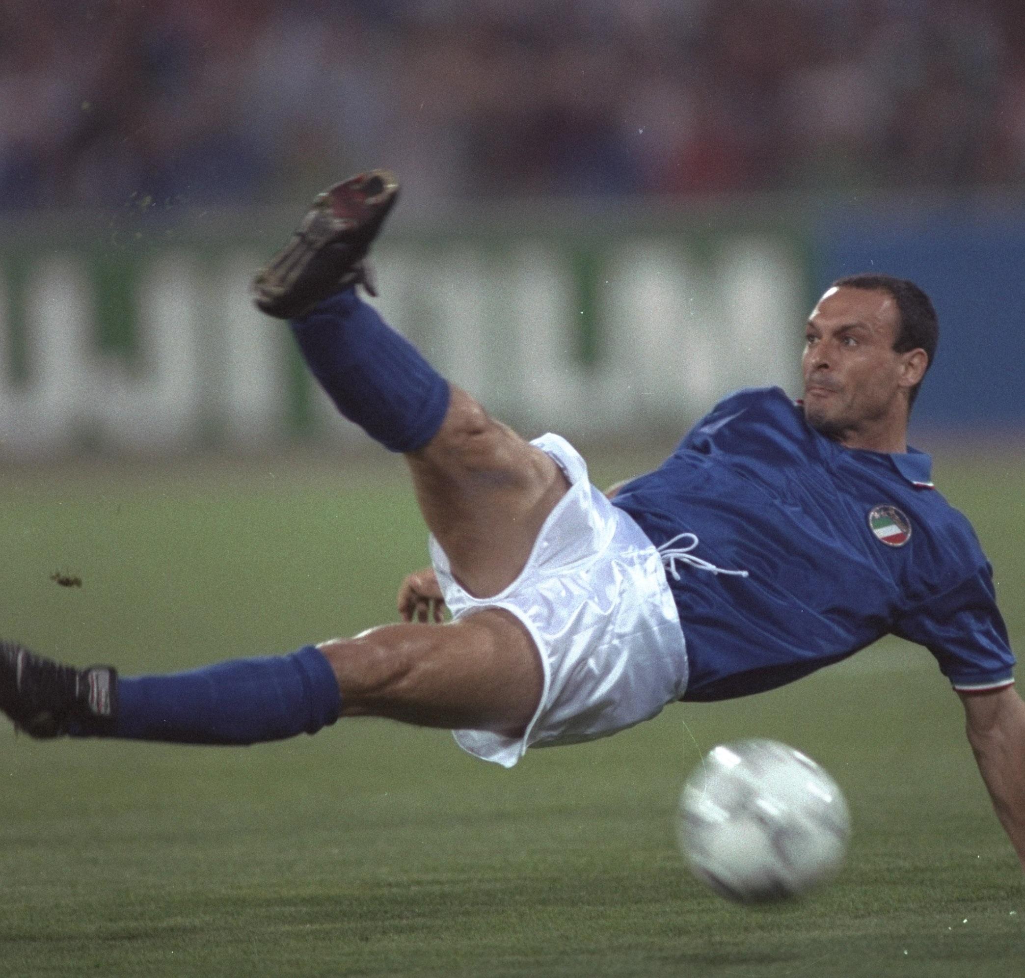 25 Jun 1990: Salvatore Schillaci of Italy in action against Uruguay at the 1990 World Cup in Rome. Schillaci scored the first goal for Italy. Italy won the match 2-0. \\\\ Mandatory Credit: Allsport /Allsport