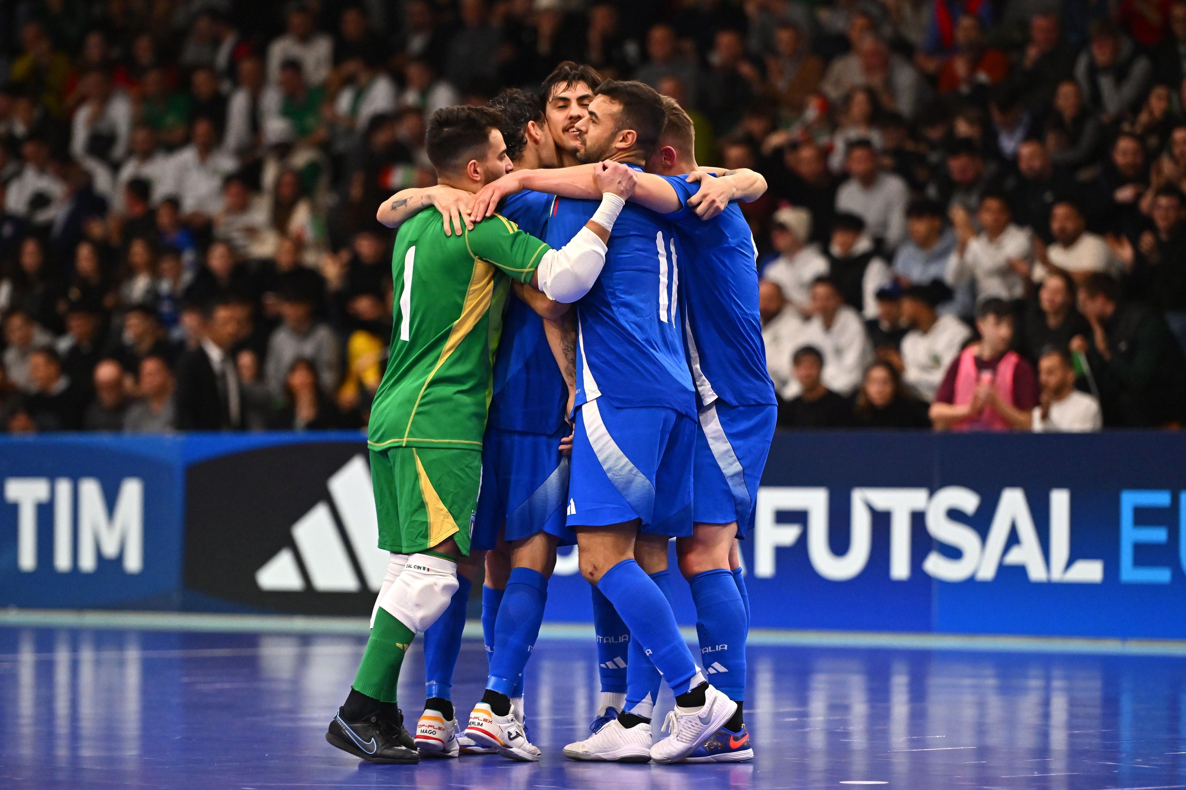 REGGIO NELL'EMILIA, ITALY - MARCH 06:Italian players celebrate after scoring a goal during the UEFA Futsal EURO 2026 Qualifying Round match between Italy and Malta on March 06, 2025 in Reggio nell'Emilia, Italy. (Photo by FIGC/FIGC via Getty Images)