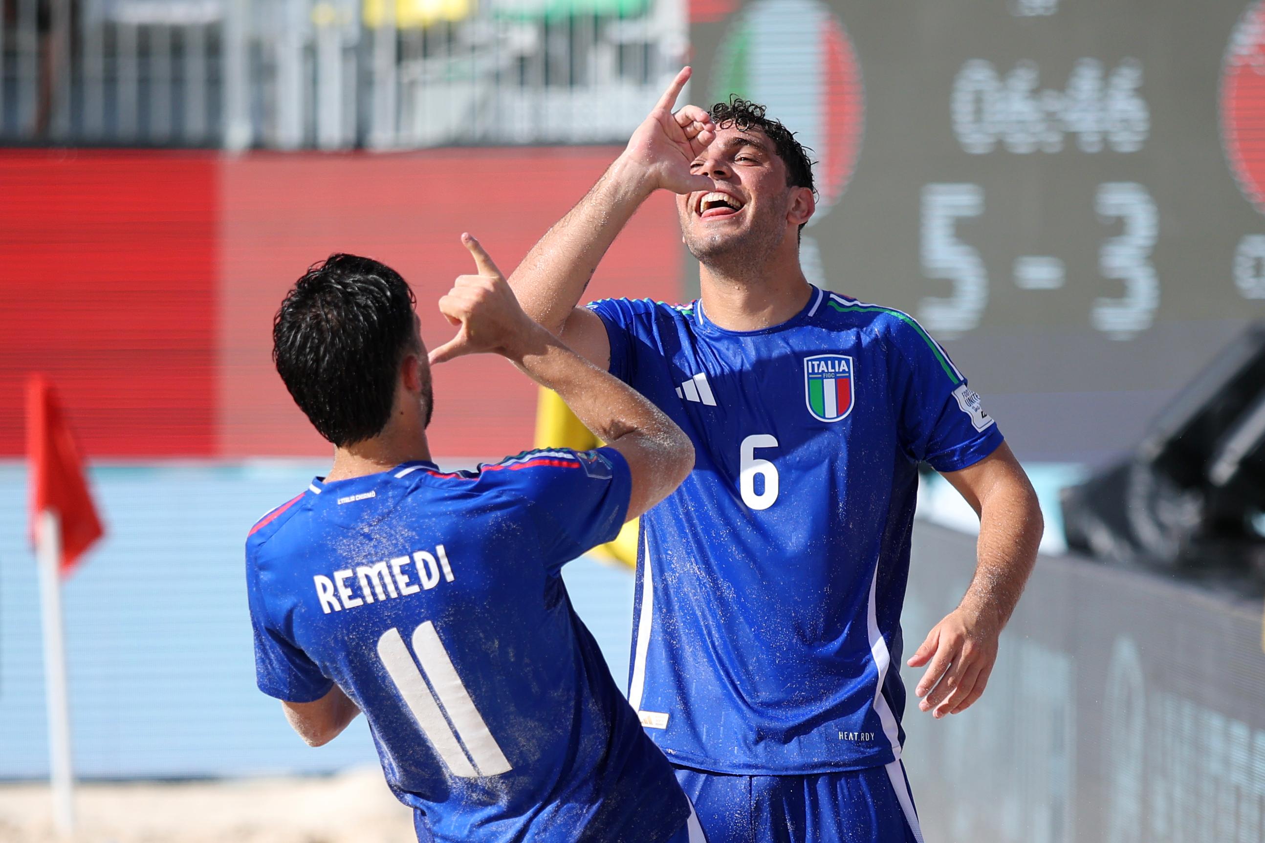 MAHE, SEYCHELLES - MAY 02: Alessandro Remedi of Italy celebrates scoring his team's fifth goal with team mate Luca Bertacca during the FIFA Beach Soccer World Cup Seychelles 2025 Group D match between Italy and Oman at The Paradise Arena on May 02, 2025 in Mahe, Seychelles. (Photo by Alex Grimm - FIFA/FIFA via Getty Images)