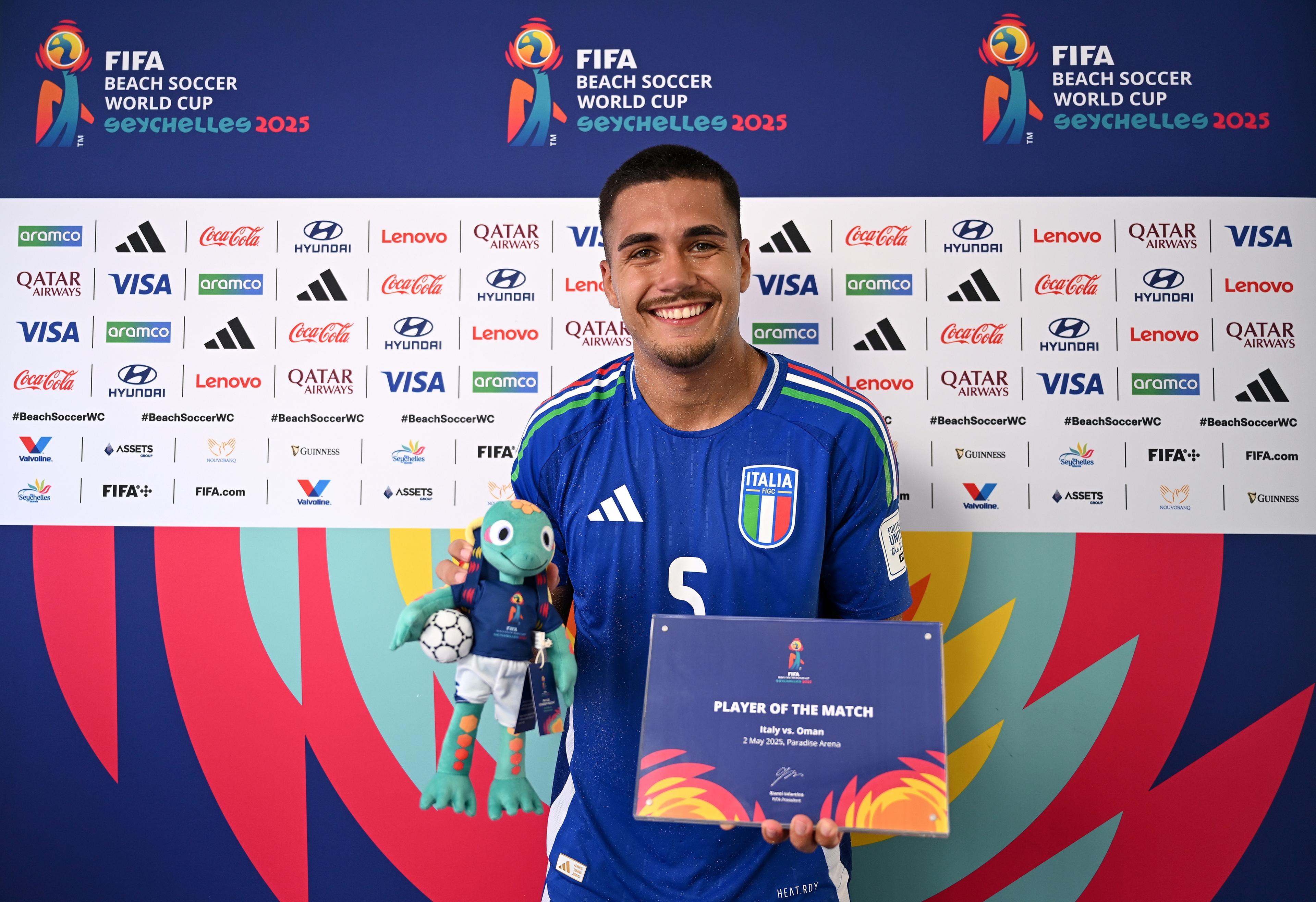 MAHE, SEYCHELLES - MAY 02: Josep Junior Gentilin of Italy poses for a photo with his Player of the Match award after the team's victory in the FIFA Beach Soccer World Cup Seychelles 2025 Group D match between Italy and Oman at The Paradise Arena on May 02, 2025 in Mahe, Seychelles. (Photo by Tullio Puglia - FIFA/FIFA via Getty Images)