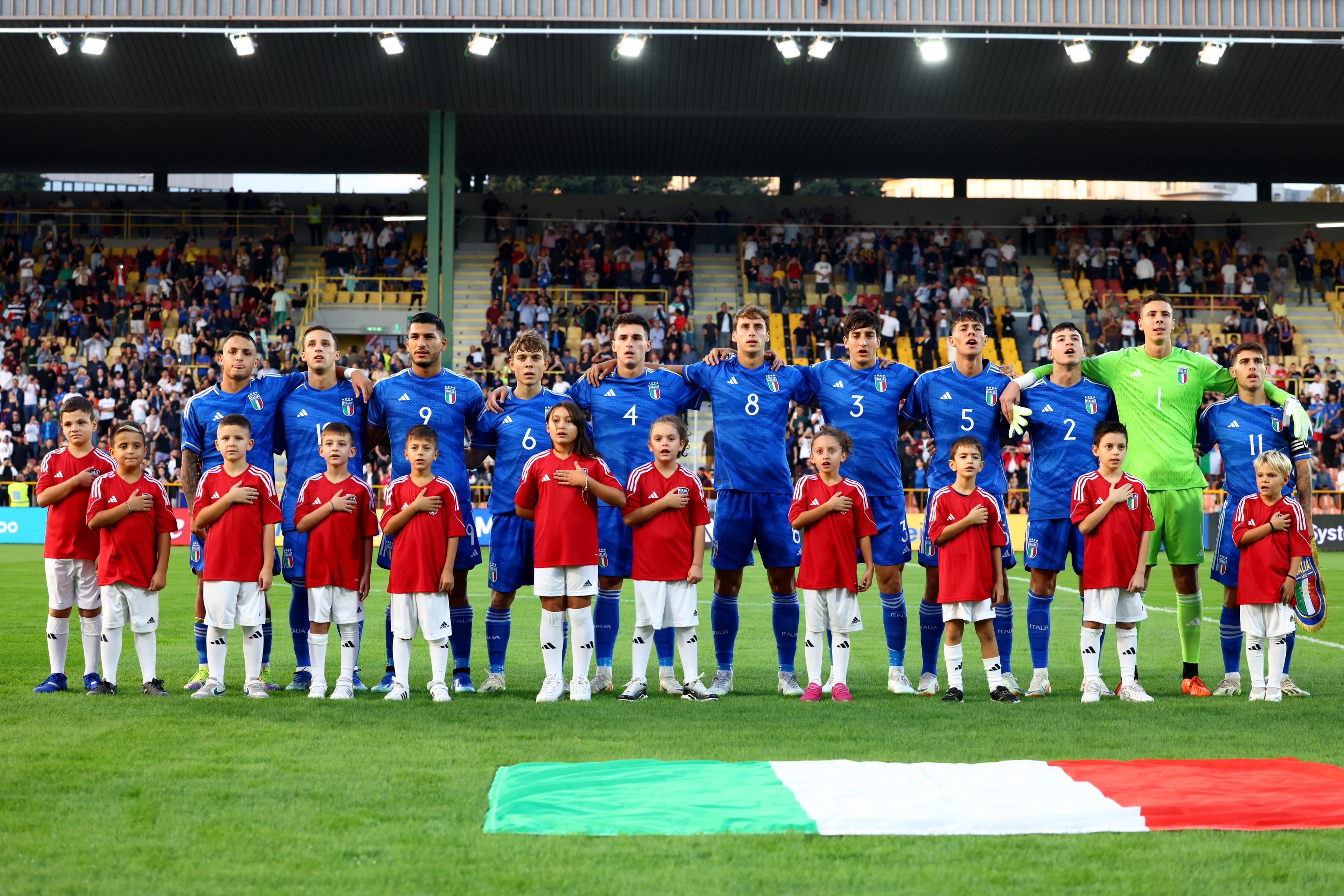 CATANZARO, ITALY - OCTOBER 13: Players of Italy sign the national anthem prior the Elite League match between Italy U20 and Poland U20 on October 13, 2023 in Catanzaro, Italy. (Photo by Maurizio Lagana/Getty Images)