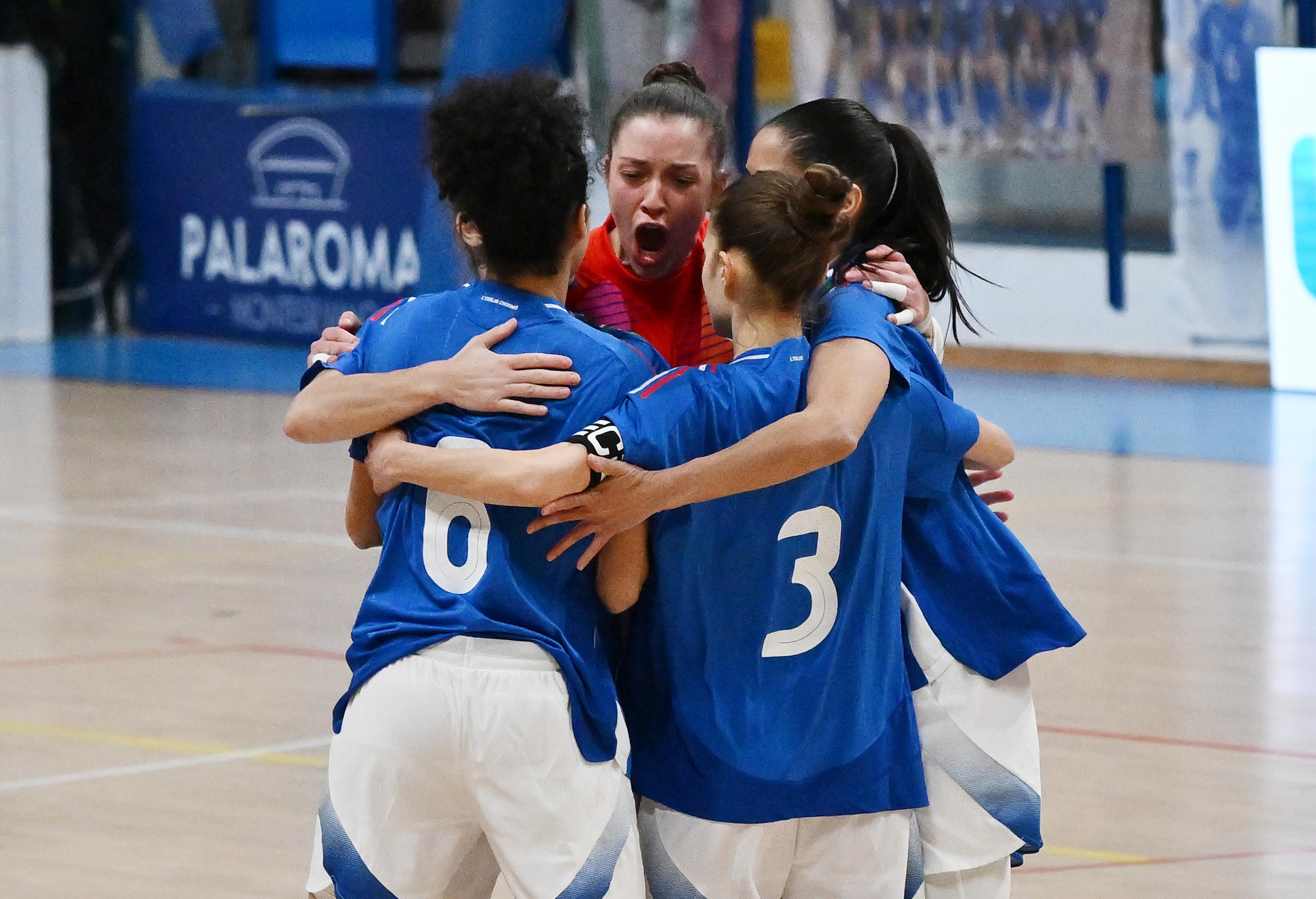 MONTESILVANO, ITALY - MARCH 20: Sara Boutimah of Italy celebrates with his teammates after scoring opening goal during FIFA Futsal Women's World Cup Qualifying Round match between Italy and Sweden at Palasport Corrado Roma on March 20, 2025 in Montesilvano, Italy. (Photo by Giuseppe Bellini - FIGC/FIGC via Getty Images)