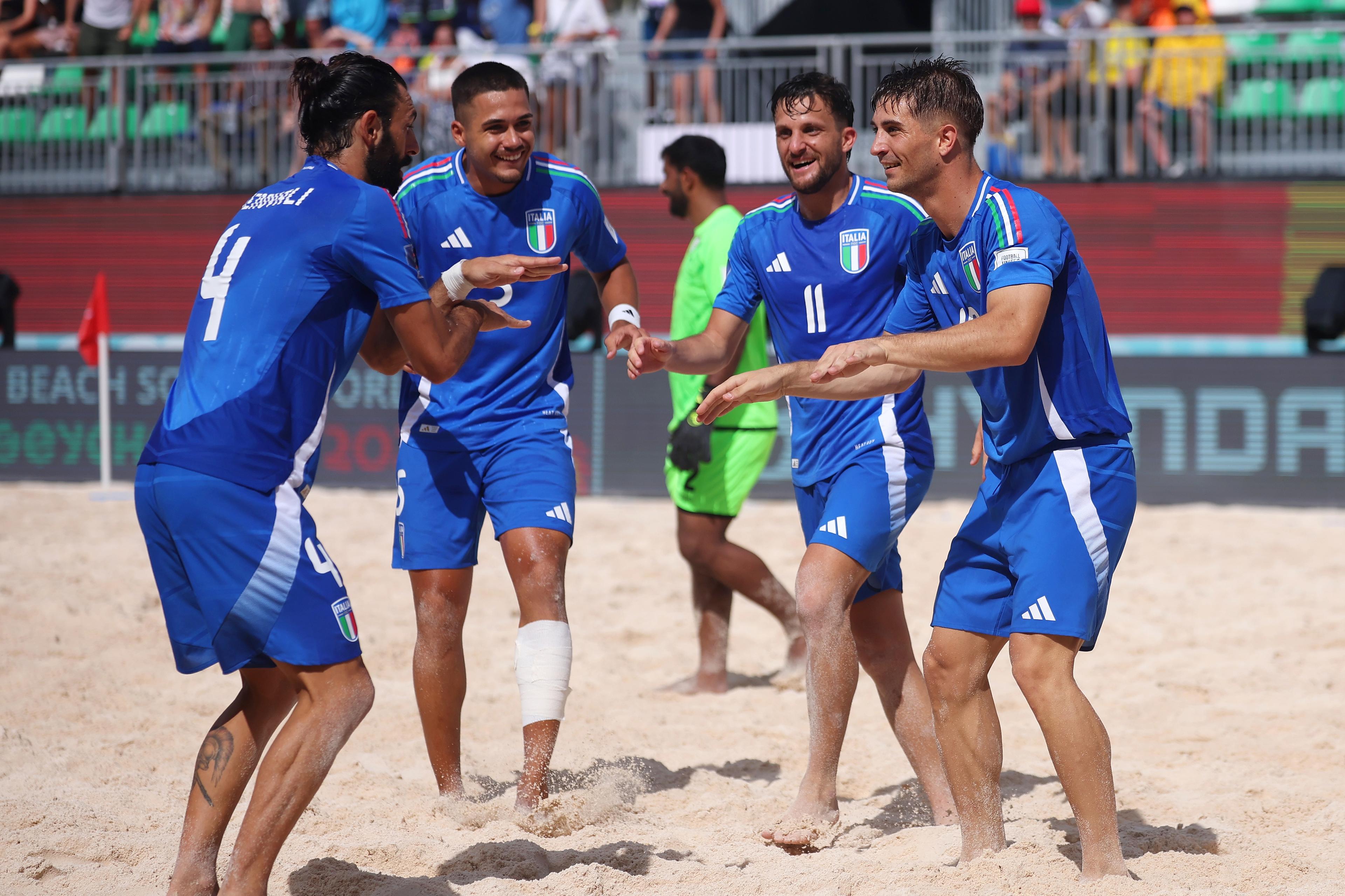 MAHE, SEYCHELLES - MAY 02: Tommaso Fazzini of Italy celebrates scoring his team\\'s first goal with team mates during the FIFA Beach Soccer World Cup Seychelles 2025 Group D match between Italy and Oman at The Paradise Arena on May 02, 2025 in Mahe, Seychelles. (Photo by Alex Grimm - FIFA/FIFA via Getty Images)