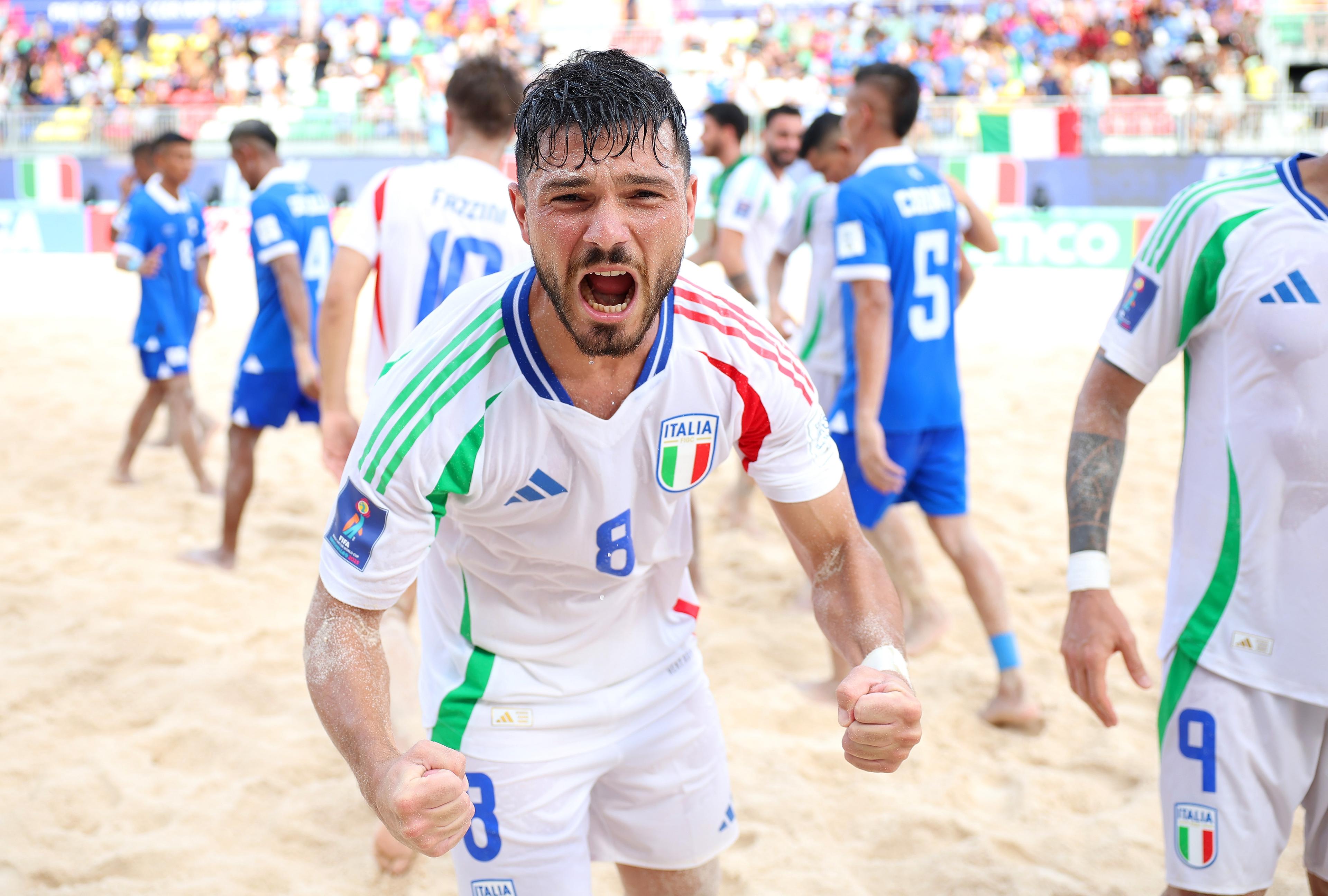 MAHE, SEYCHELLES - MAY 06: Ovidio Alla of Italy celebrates after the team's victory in the FIFA Beach Soccer World Cup Seychelles 2025 Group D match between El Salvador and Italy at The Paradise Arena on May 06, 2025 in Mahe, Seychelles. (Photo by Alex Grimm - FIFA/FIFA via Getty Images)