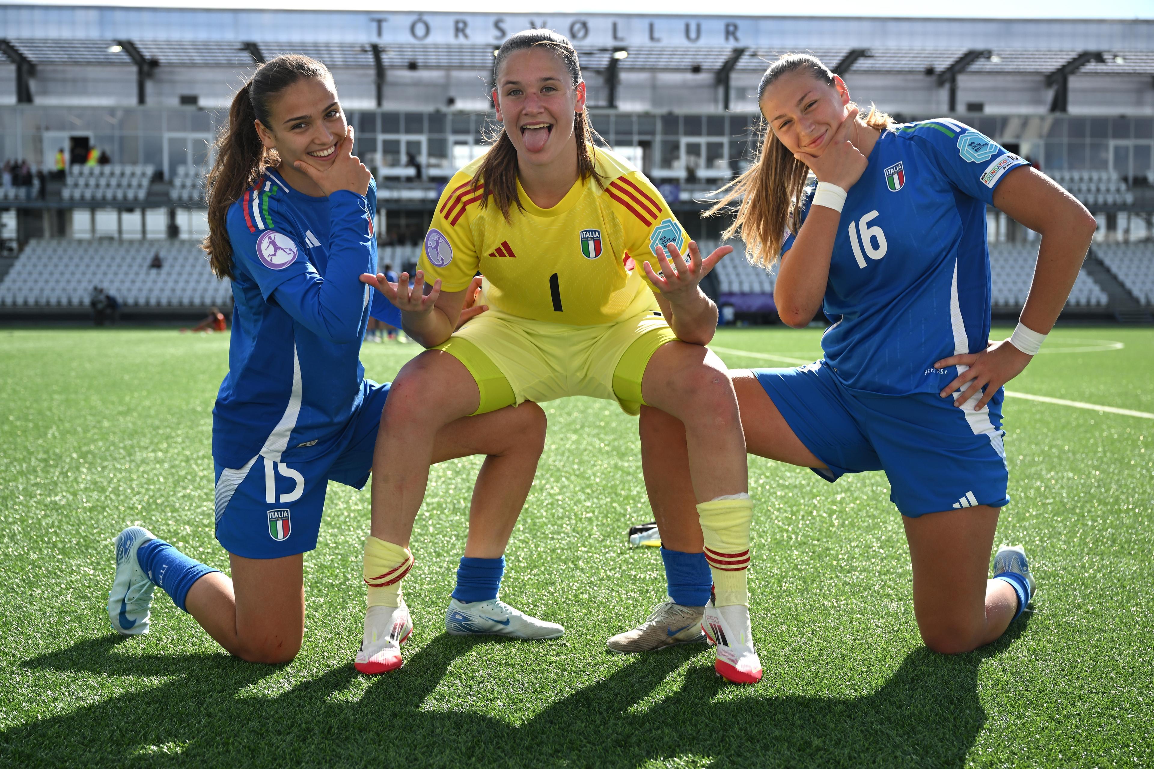 THORSHAVN, FAEROE ISLANDS - MAY 11: Sofia Verrini of Italy, Matilde Robbioni of Italy and Martina Bressan of Italy celebrate victory following the UEFA Women's European Under-17 Championship 2024/25 Group B match between Italy and Spain at Torsvollur on May 11, 2025 in Thorshavn, Faeroe Islands. (Photo by Shauna Clinton/UEFA via Getty Images)