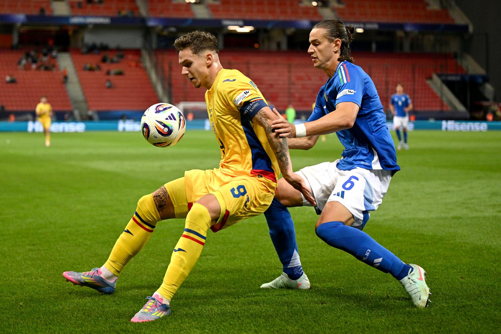 TRNAVA, SLOVAKIA - JUNE 11: Louis Munteanu of Romania being followed by Daniele Ghilardi of Italy during the UEFA European Under-21 Championship 2025 Group Stage match between Italy and Romania at A. Malatinsky Stadium on June 11, 2025 in Trnava, Slovakia. (Photo by Tullio Puglia - UEFA/UEFA via Getty Images)