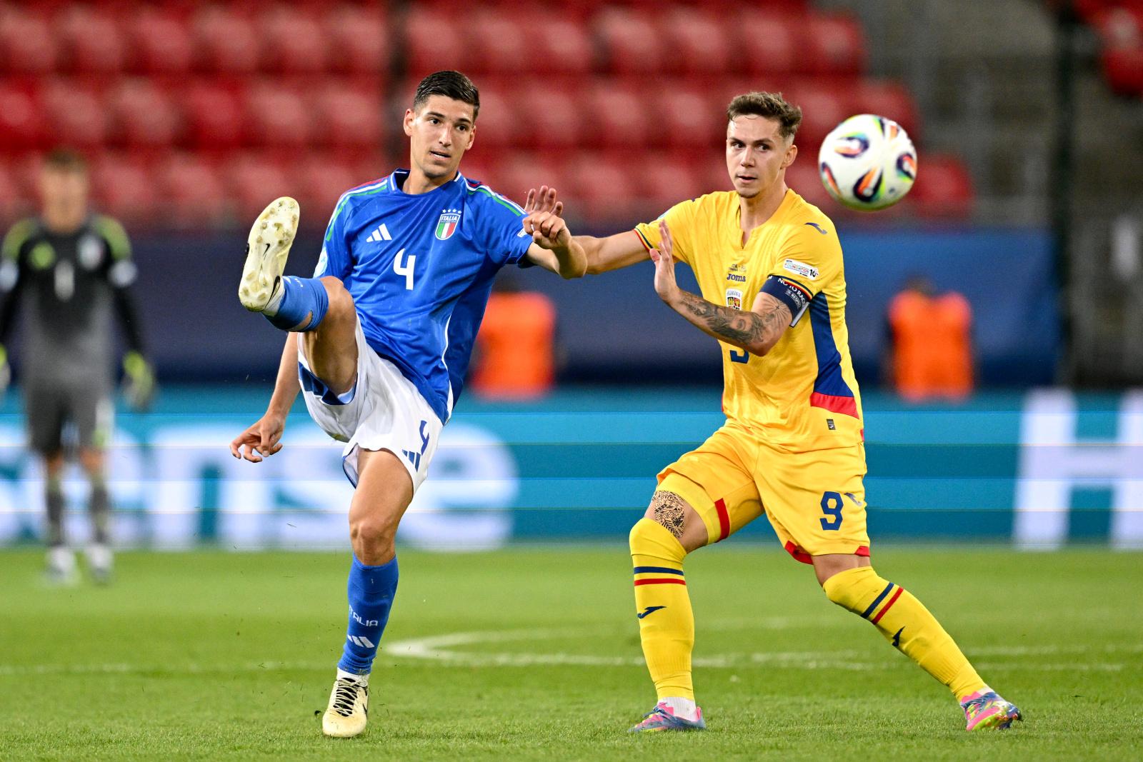 TRNAVA, SLOVAKIA - JUNE 11: Matteo Prati of Italy competes for the ball with Louis Munteanu of Romania during the UEFA European Under-21 Championship 2025 Group Stage match between Italy and Romania at A. Malatinsky Stadium on June 11, 2025 in Trnava, Slovakia. (Photo by Tullio Puglia - UEFA/UEFA via Getty Images)