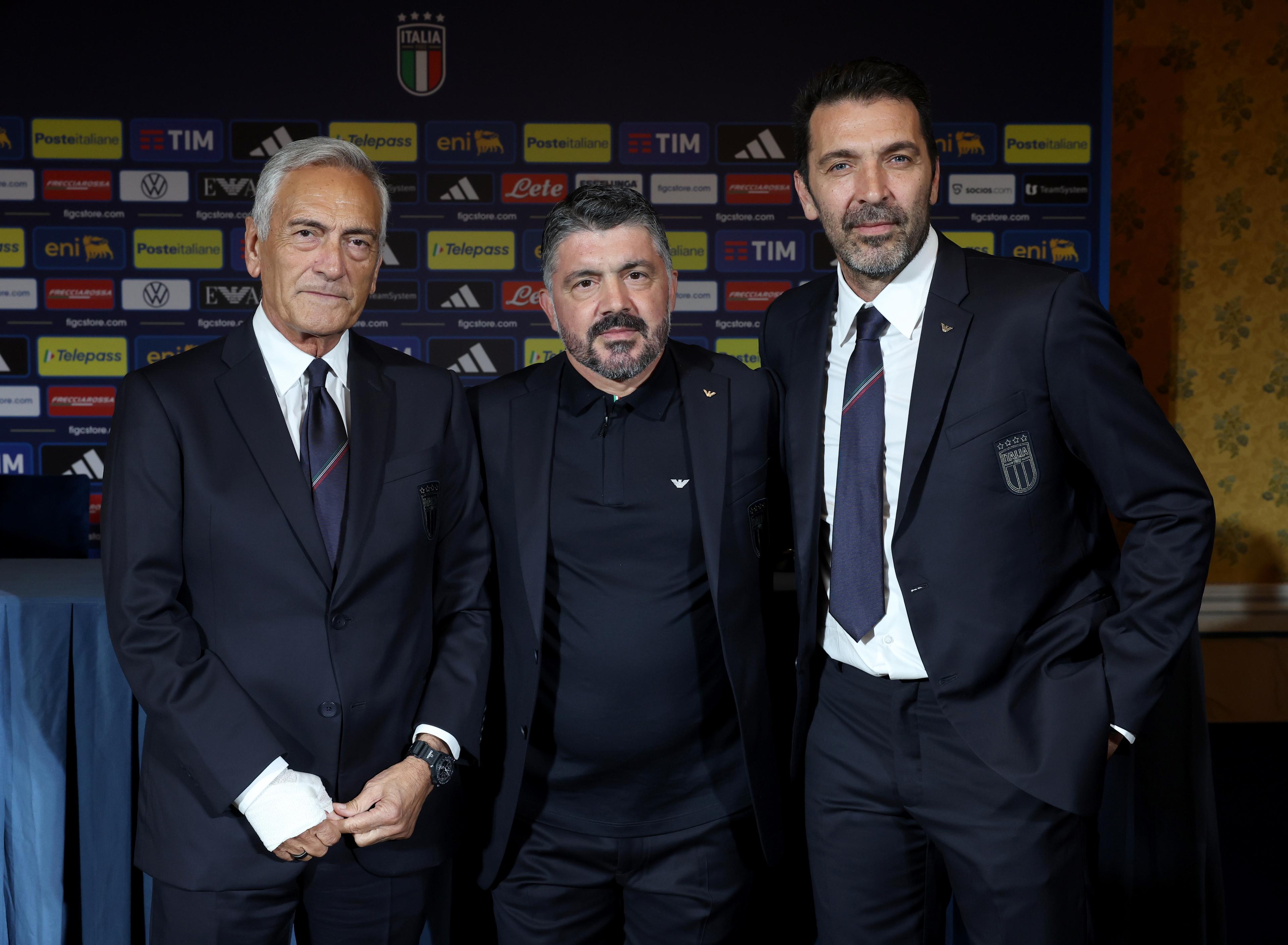 ROME, ITALY - JUNE 19: President FIGC Gabriele Gravina, new head coach Italy Gennaro Gattuso and head of Italy delegation Gianluigi Buffon pose for a photo prior to the press conference at Hotel Parco dei Principi on June 19, 2025 in Rome, Italy. (Photo by Claudio Villa - FIGC/FIGC via Getty Images)