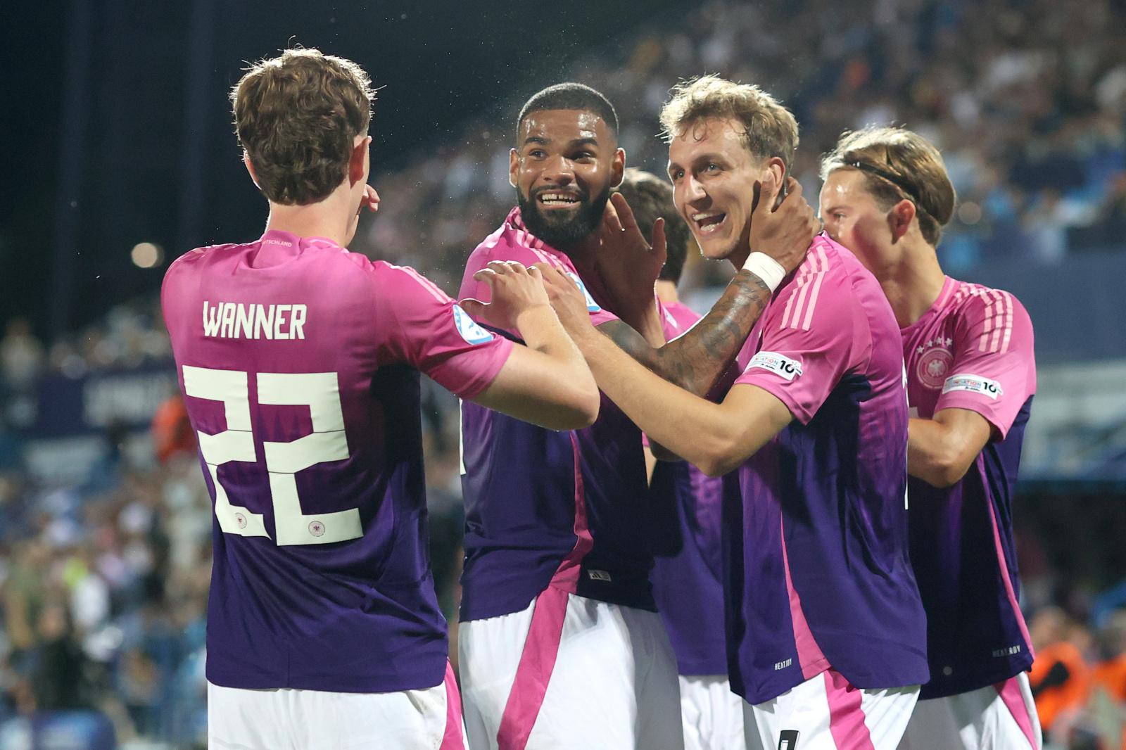 NITRA, SLOVAKIA - JUNE 18: Nelson Weiper of Germany celebrates after scoring their second side goal during the UEFA European Under-21 Championship 2025 Group Stage match between England and Germany at Nitra Stadium on June 18, 2025 in Nitra, Slovakia. (Photo by Charlotte Wilson - UEFA/UEFA via Getty Images)