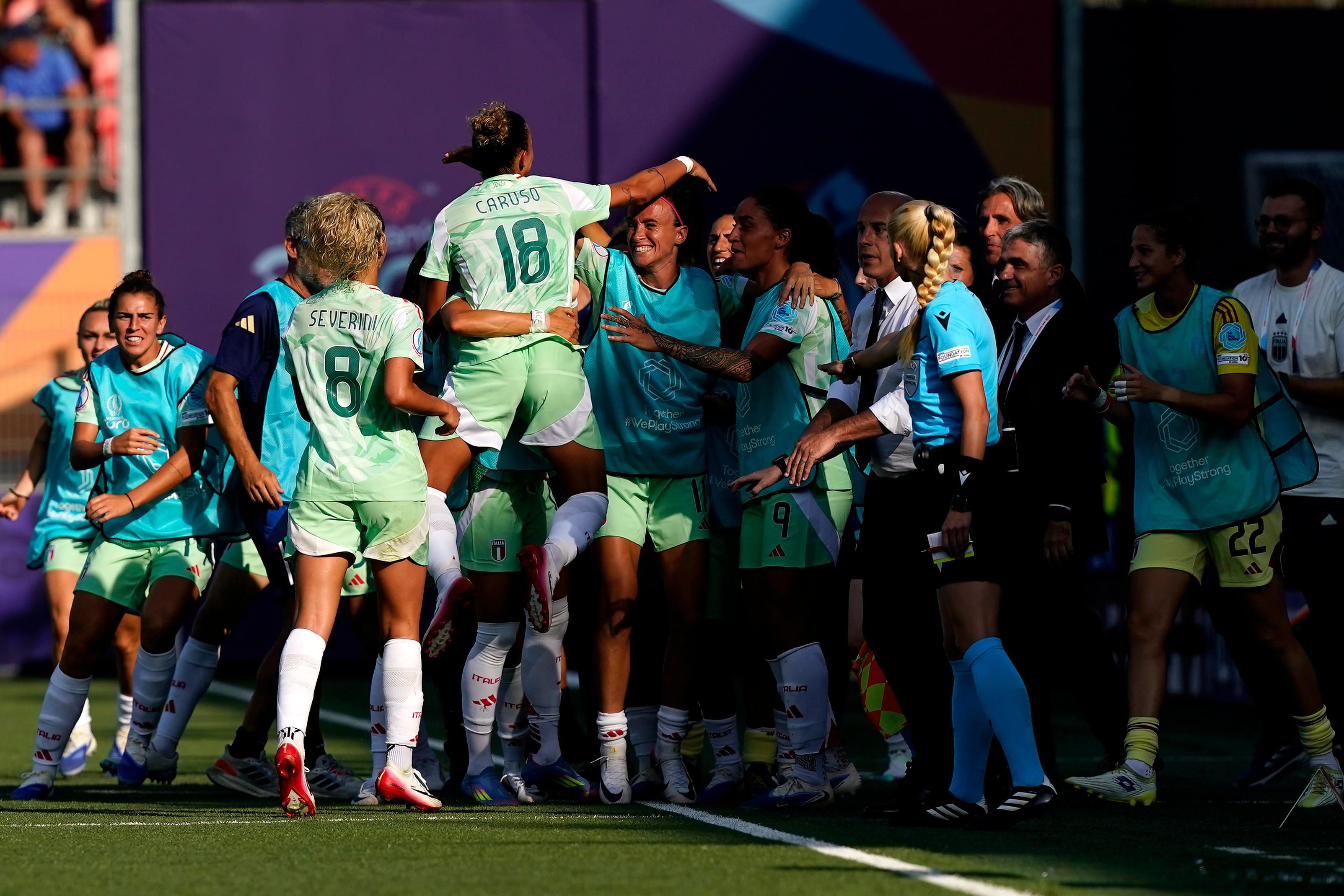 SION, SWITZERLAND - JULY 03: Arianna Caruso of Italy celebrates scoring her team\\'s first goal with teammates during the UEFA Women\\'s EURO 2025 Group B match between Belgium and Italy at Stade de Tourbillon on July 03, 2025 in Sion, Switzerland. (Photo by Pier Marco Tacca - FIGC/FIGC via Getty Images)