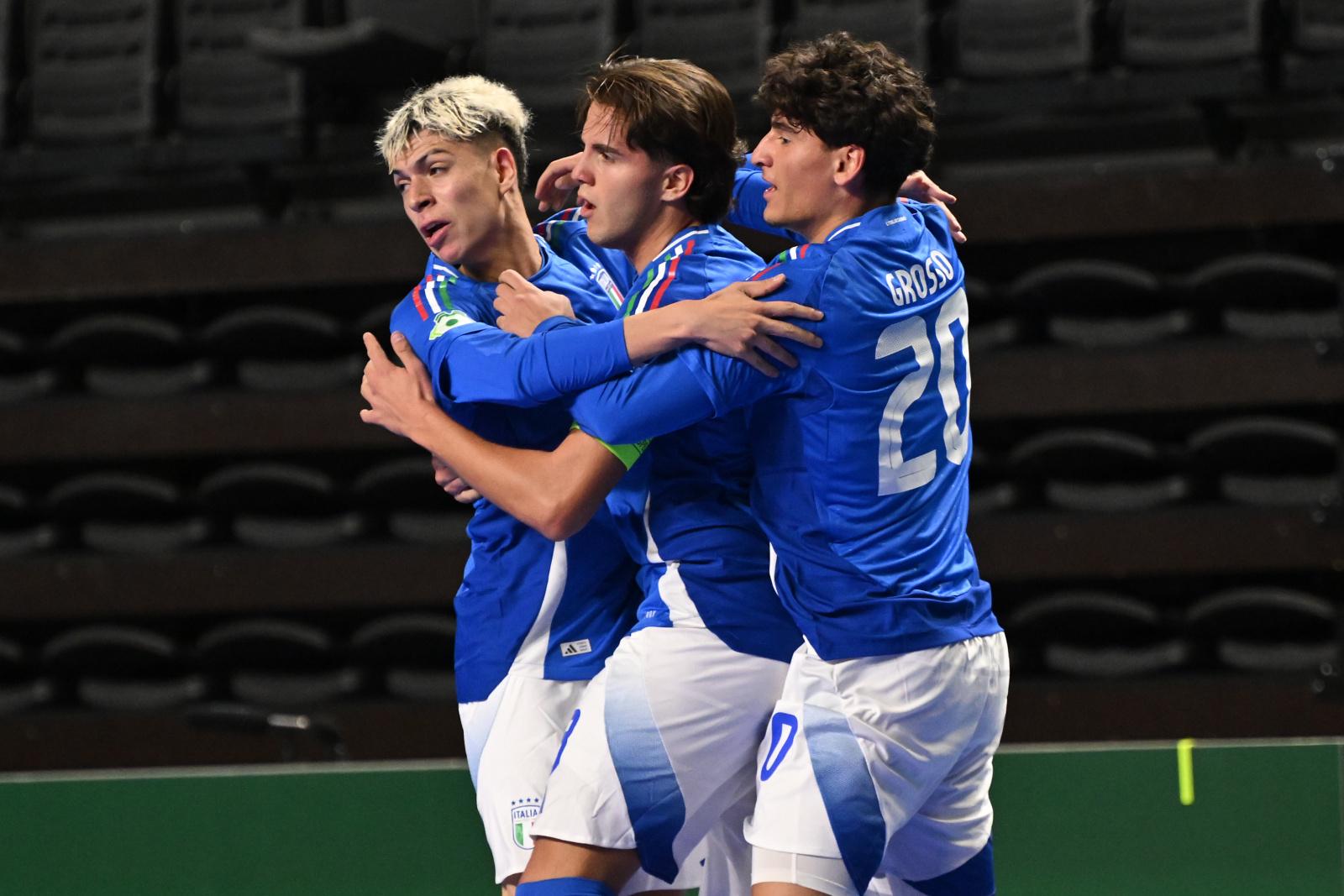 CHISINAU, MOLDOVA - SEPTEMBER 28: Tommaso Ceccarelli of Italy celebrates with teammates after scoring the equalizing goal during the UEFA Under-19 Futsal Euro 2025 match between Portugal and Italy at Chisinau Arena on September 28, 2025 in Chisinau, Moldova. (Photo by Tullio Puglia - UEFA/UEFA via Getty Images)