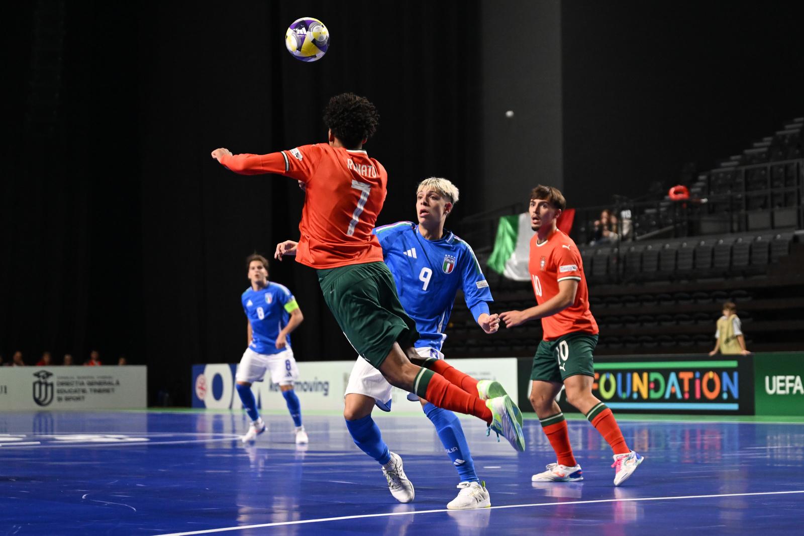 CHISINAU, MOLDOVA - SEPTEMBER 28: Renato Fernandes Almeida of Portugal jumps for a header as Enrico Alves Rodrigues of Italy tackles during the UEFA Under-19 Futsal Euro 2025 match between Portugal and Italy at Chisinau Arena on September 28, 2025 in Chisinau, Moldova. (Photo by Tullio Puglia - UEFA/UEFA via Getty Images)