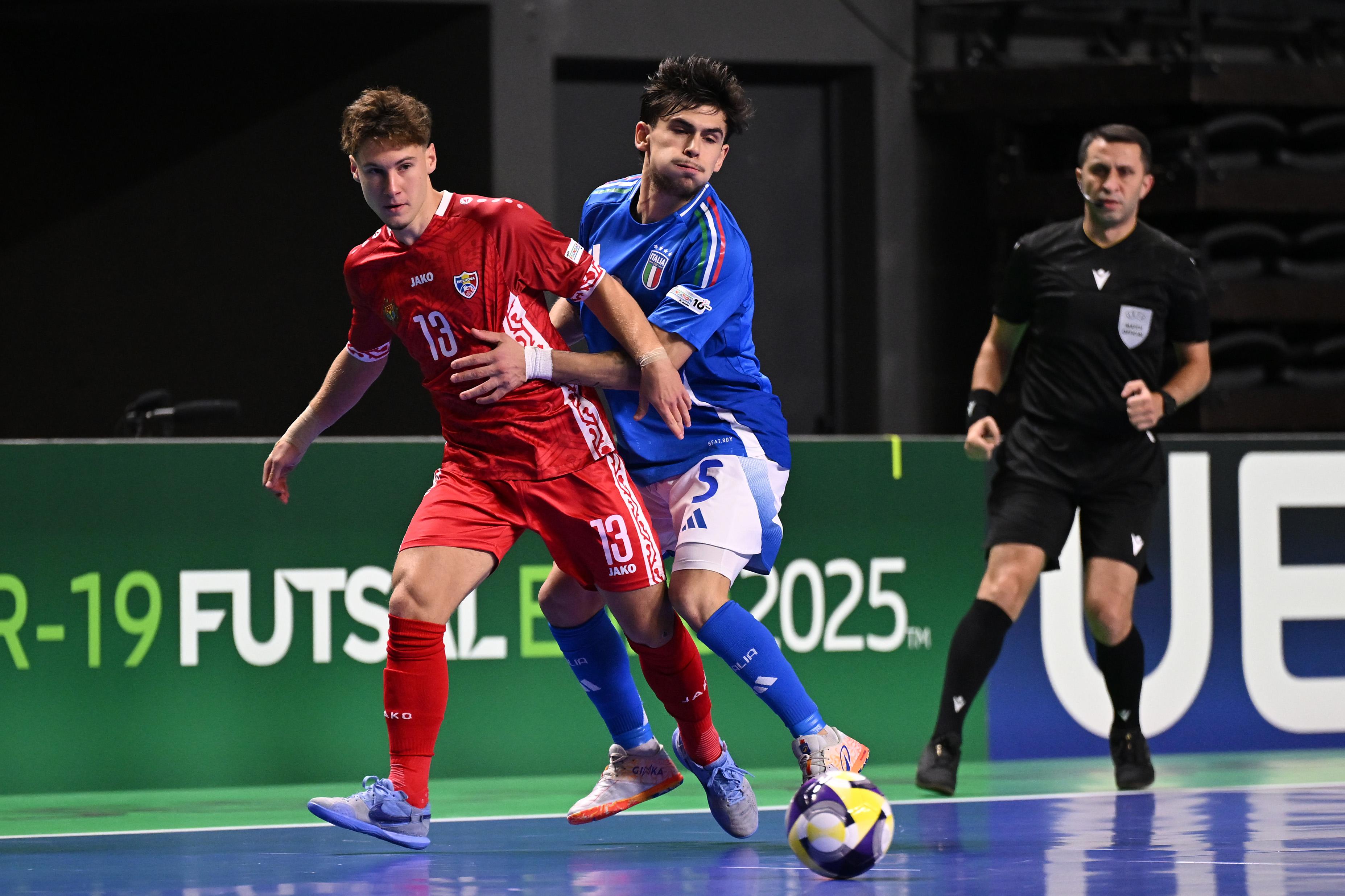 CHISINAU, MOLDOVA - SEPTEMBER 29: Vadim Bejenaru of Moldova and Ivan Cutruneo of Italy compete for the ball during the UEFA Under-19 Futsal Euro 2025 match between Italy and Moldova at Chisinau Arena on September 29, 2025 in Chisinau, Moldova. (Photo by Tullio Puglia - UEFA/UEFA via Getty Images) , UEFA via Getty Images