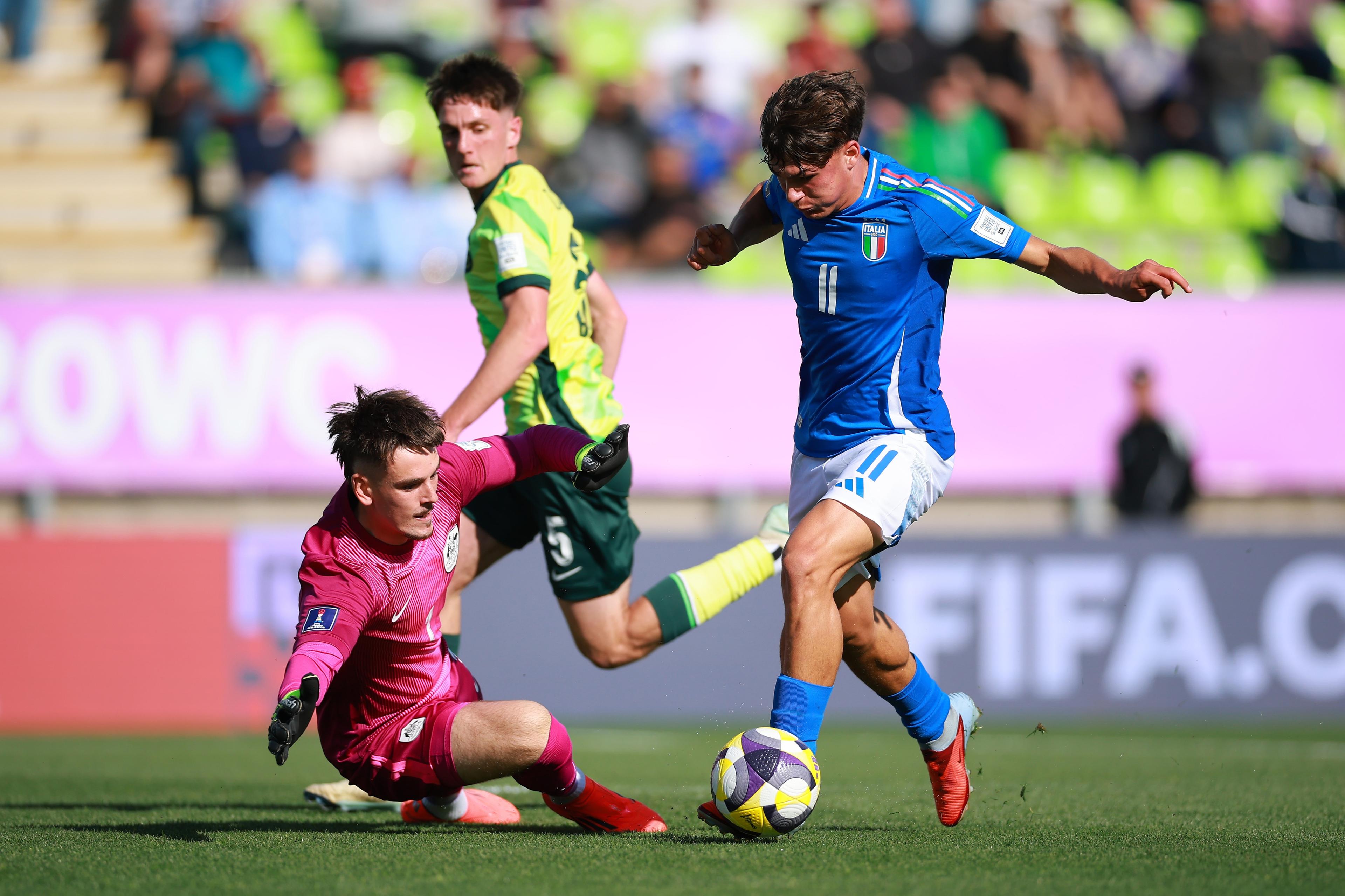 VALPARAISO, CHILE - SEPTEMBER 28: Mattia Mosconi of Italy is fouled by Steven Hall of Australia during the FIFA U-20 World Cup Chile 2025 Group D match between Italy and Australia at Estadio El\\u00EDas Figueroa Brander on September 28, 2025 in Valparaiso, Chile. (Photo by Hector Vivas - FIFA/FIFA via Getty Images) , FIFA via Getty Images