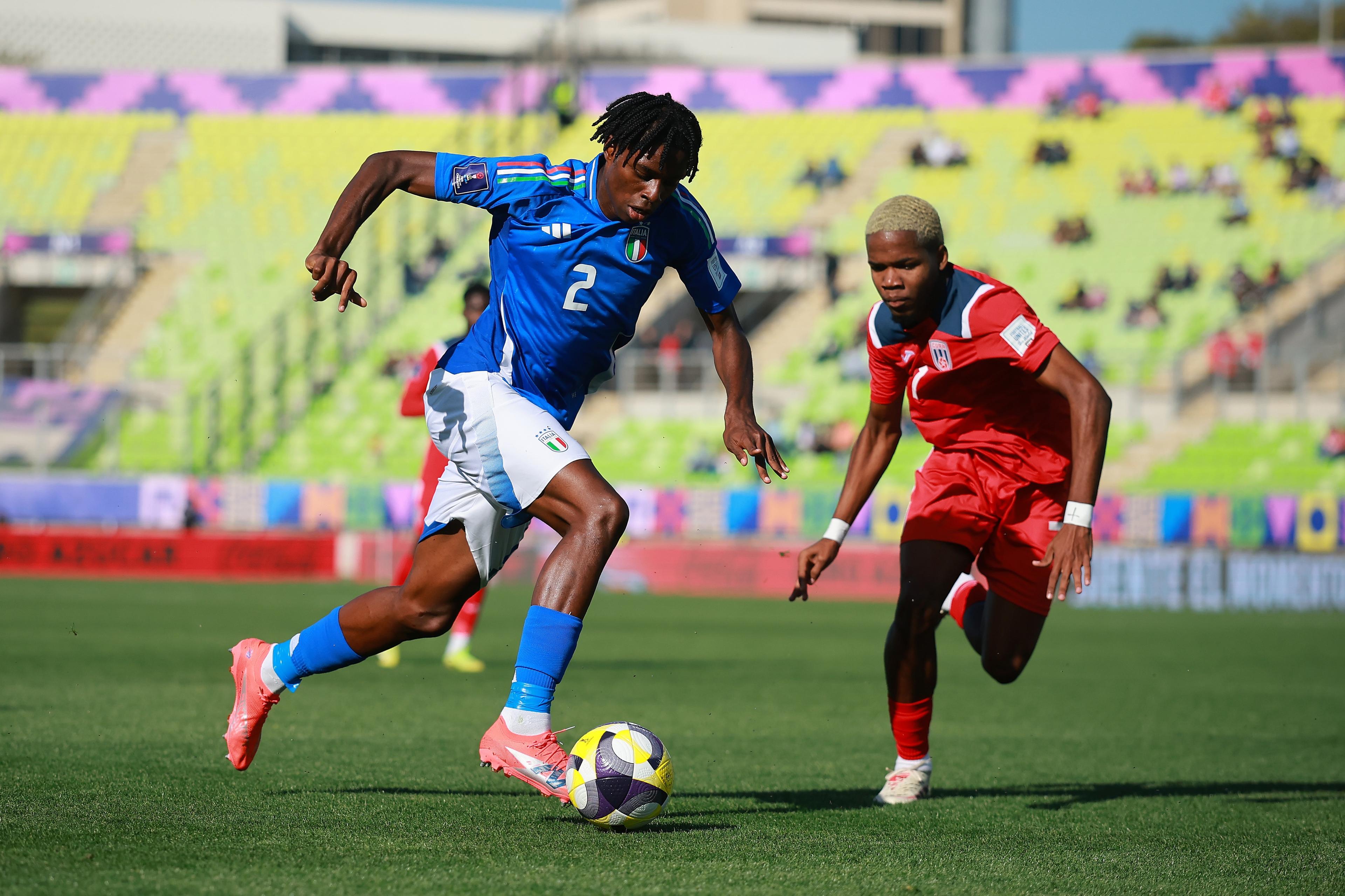 VALPARAISO, CHILE - OCTOBER 01: Javison Idele of Italy is challenged by Jade Quinones of Cuba during the FIFA U-20 World Cup Chile 2025 Group D match between Italy and Cuba at Estadio El\\u00EDas Figueroa Brander on October 01, 2025 in Valparaiso, Chile. (Photo by Hector Vivas - FIFA/FIFA via Getty Images) , FIFA via Getty Images