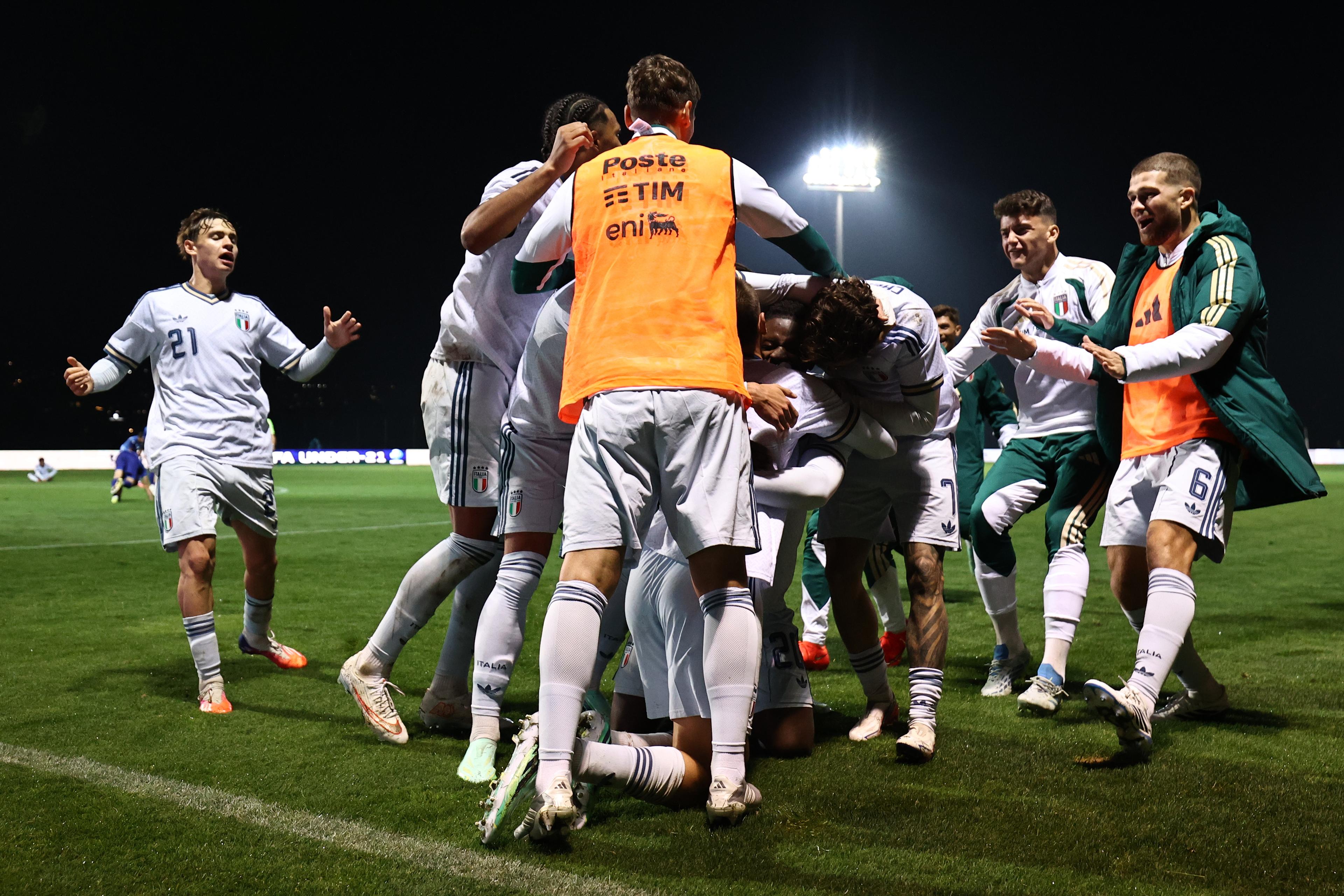 The Azzurrini celebrate the winning goal against Armenia