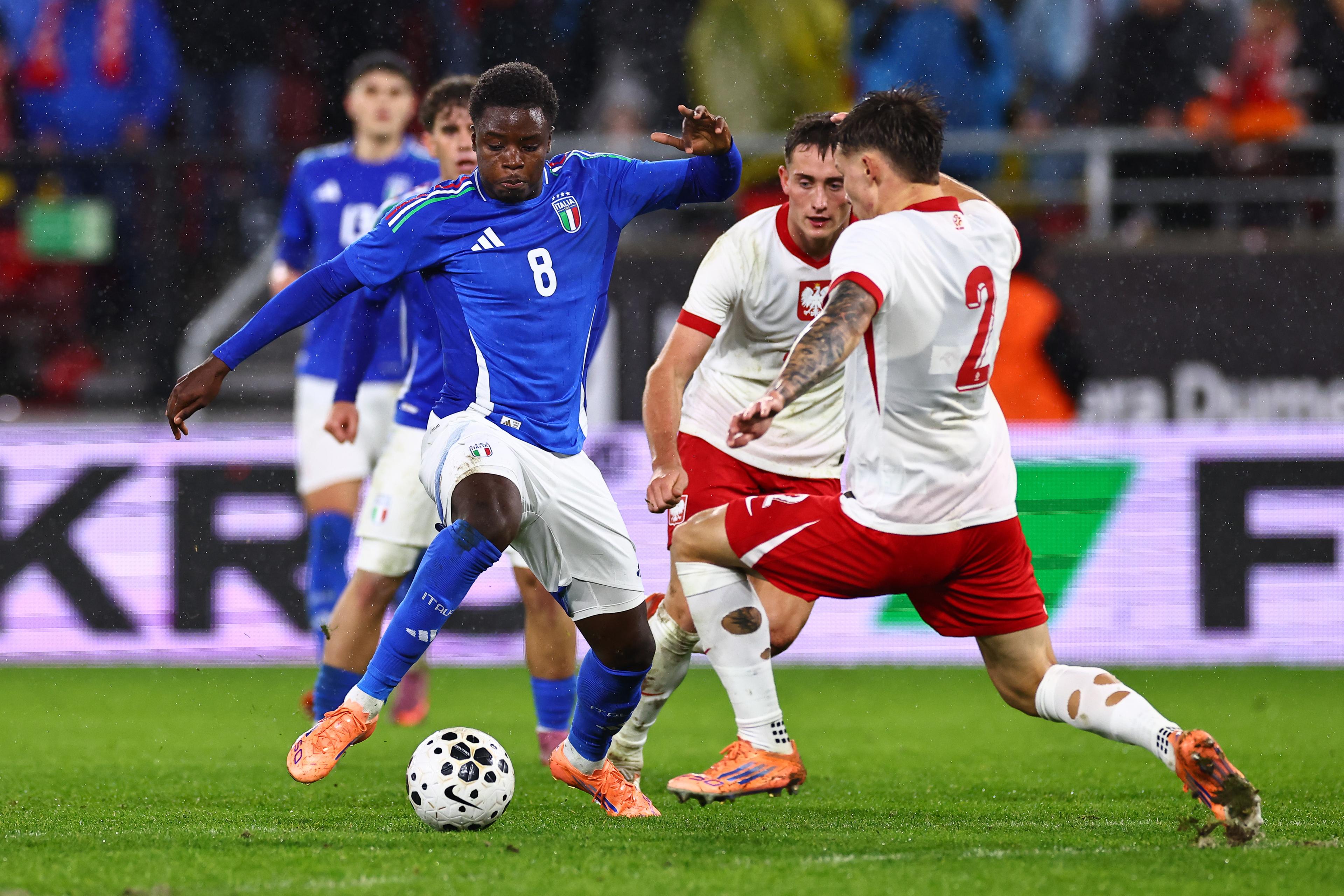 Cisse in action during the reverse fixture against Poland